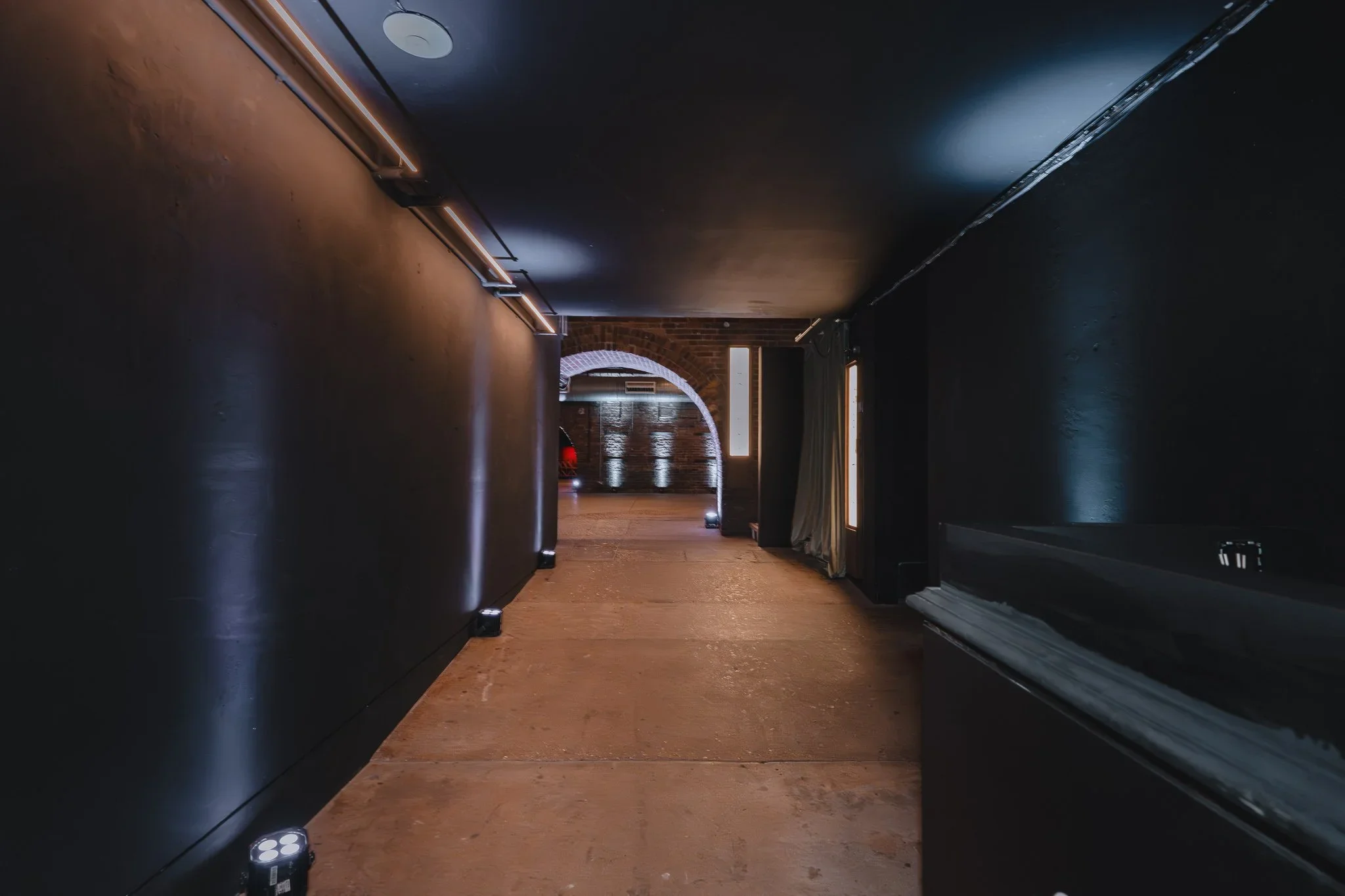 Corridor connecting the railway arches at 83 Rivington Street