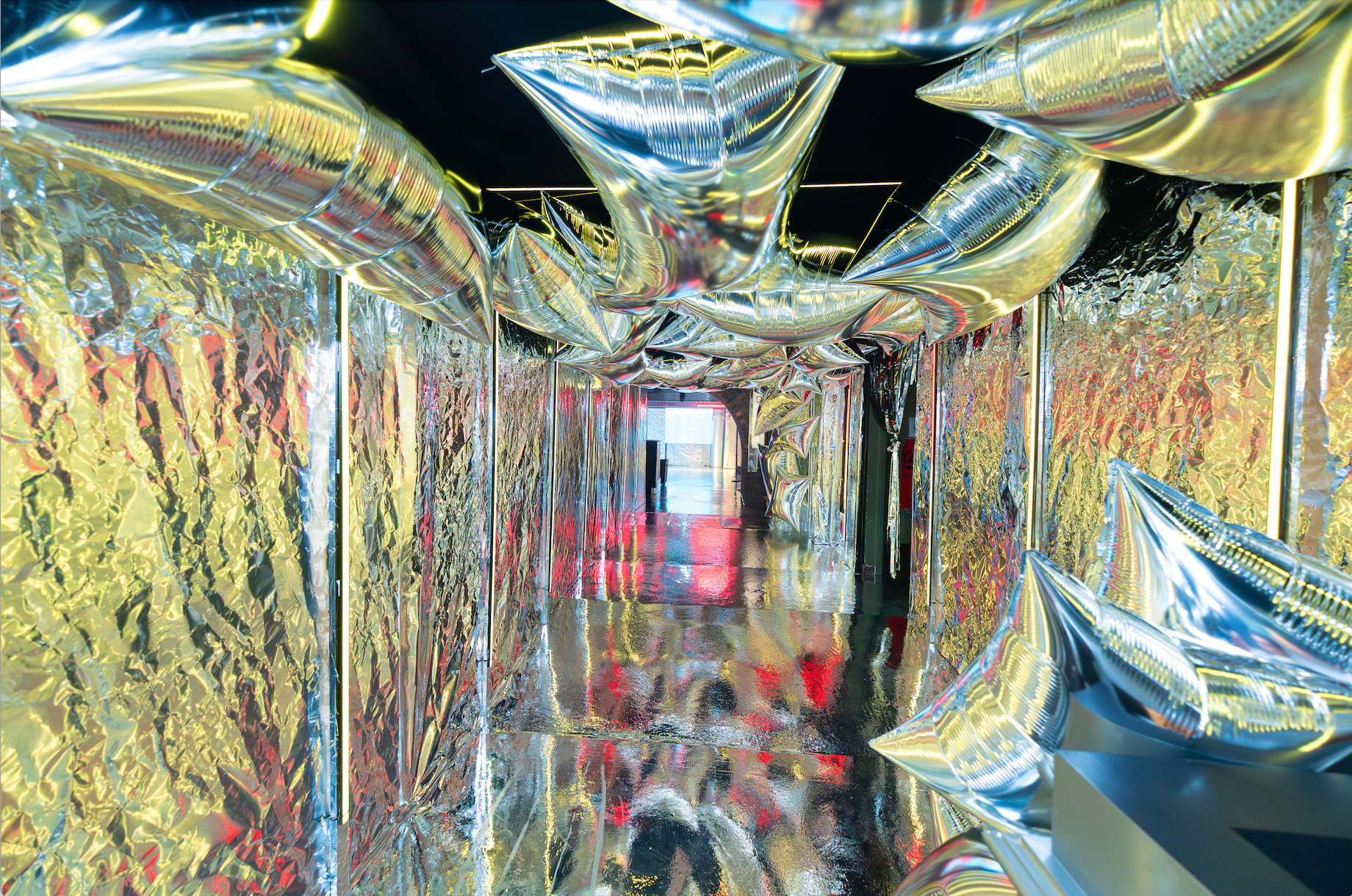 QFO brand activation at 83 Rivington Street, silver foil tunnel