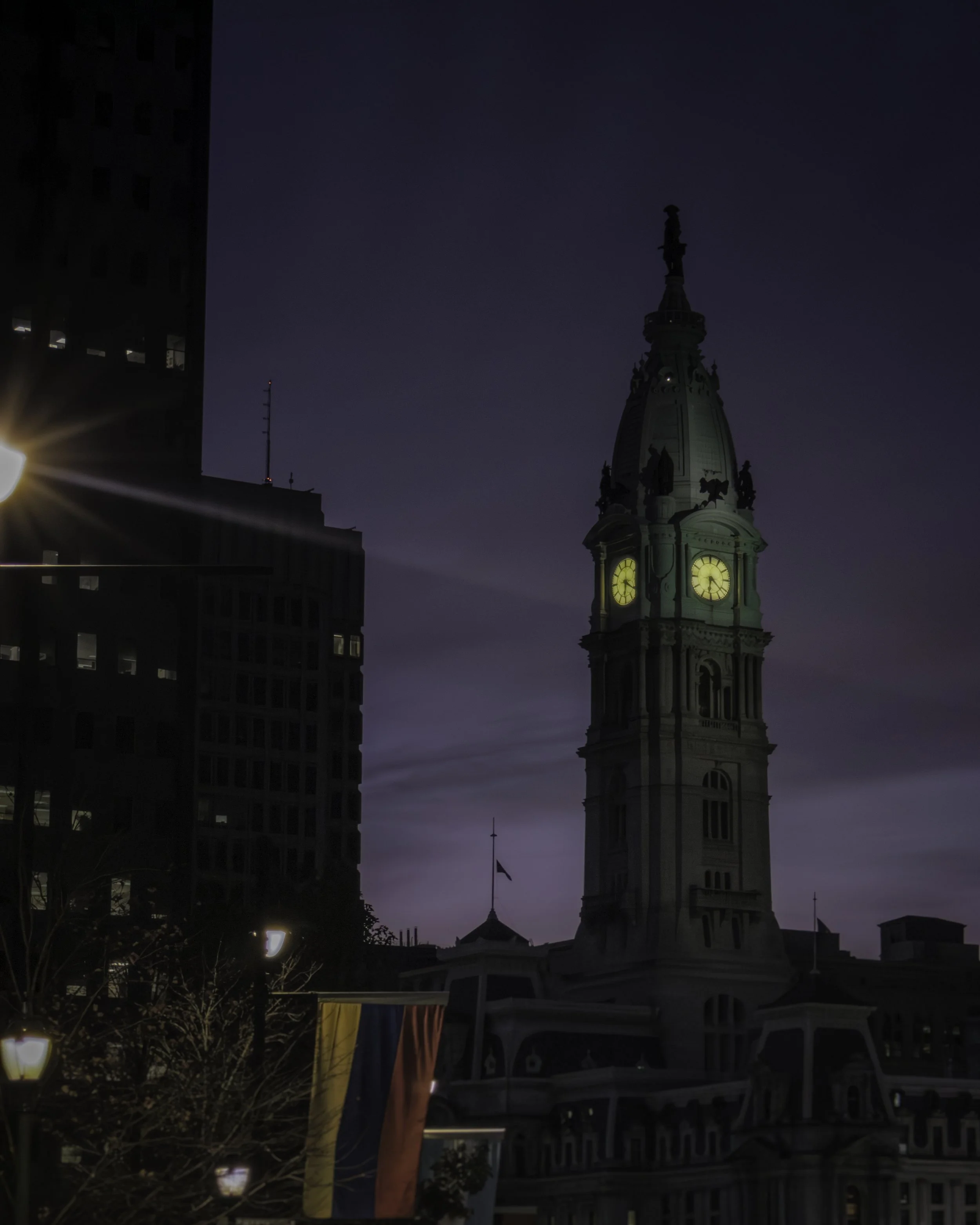 Clocktower in Violet Light
Philadelphia City Hall clock tower glowing against a deep violet evening sky.