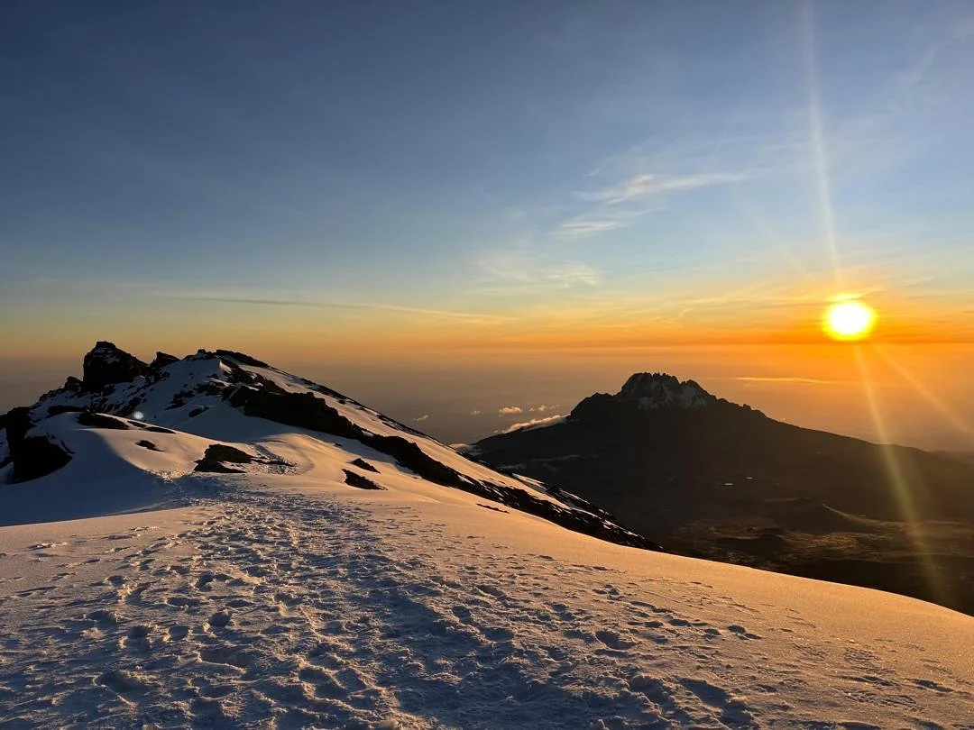 Just Wow! 

Tag a friend (or two) you&rsquo;d share this magic moment with &mdash; standing at the summit of Mount Kilimanjaro (5895m), watching the sunrise paint the sky in colours no words can describe 🌅✨

The feeling up here is beyond imagination
