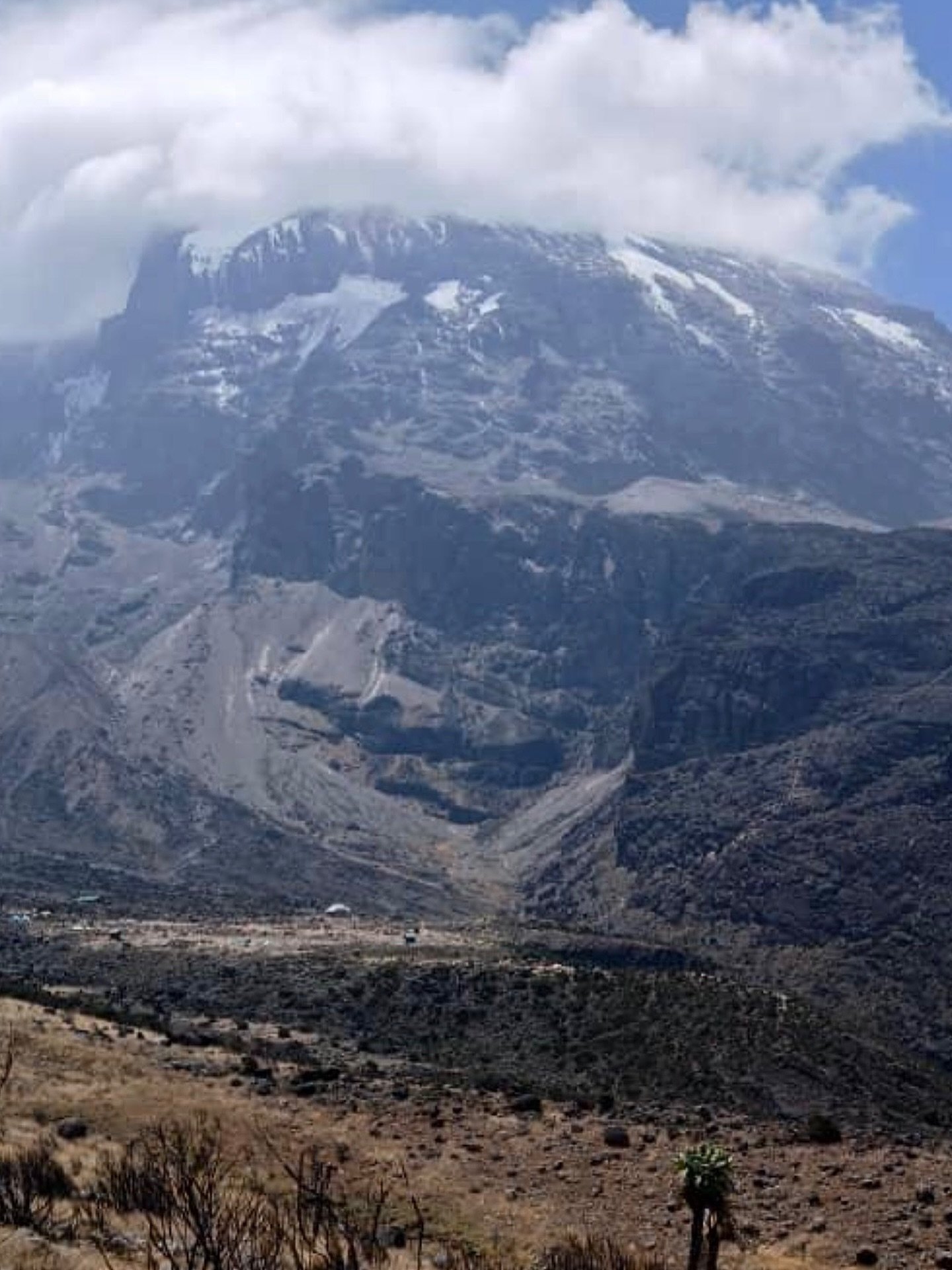 Kilimanjaro in her truest form, harsh, honest, and impossibly beautiful. The wind bites, the legs ache, and the altitude humbles you. Yet there, far below the towering wall, Barranco Camp waits like a promise. A reminder that even in the mountain&rsq