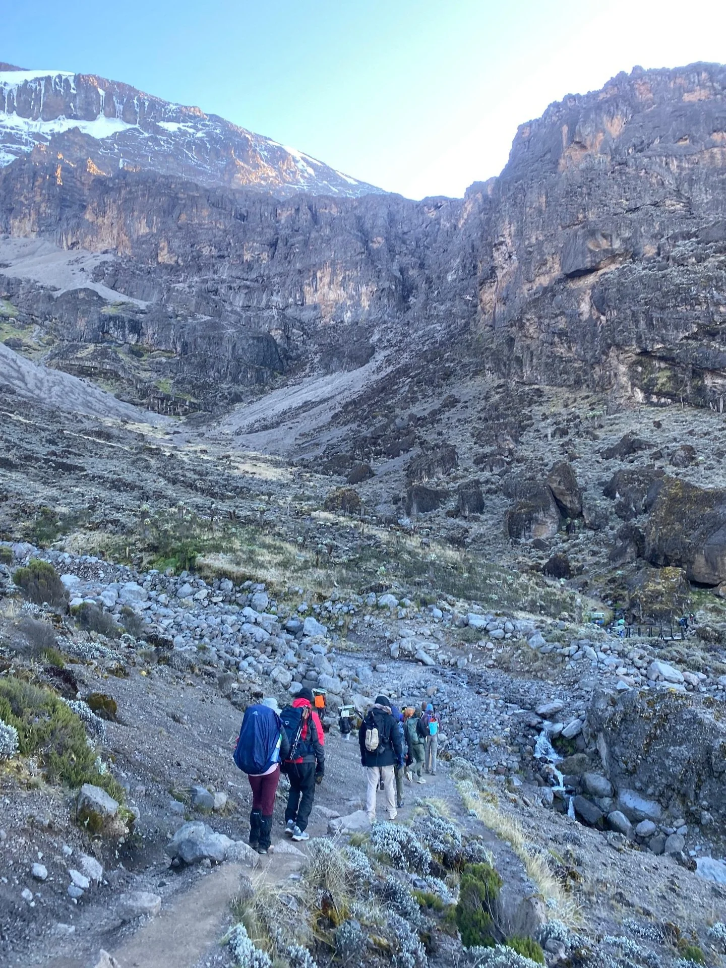 Day 5: Leaving Barranco Camp behind, we set our sights on Karanga Camp. Today we tackle the mighty Great Barranco Wall, squeezing past the famous Kissing Rock along the way. Spirits are high, legs are strong, and the team is fired up 👊Let&rsquo;s do