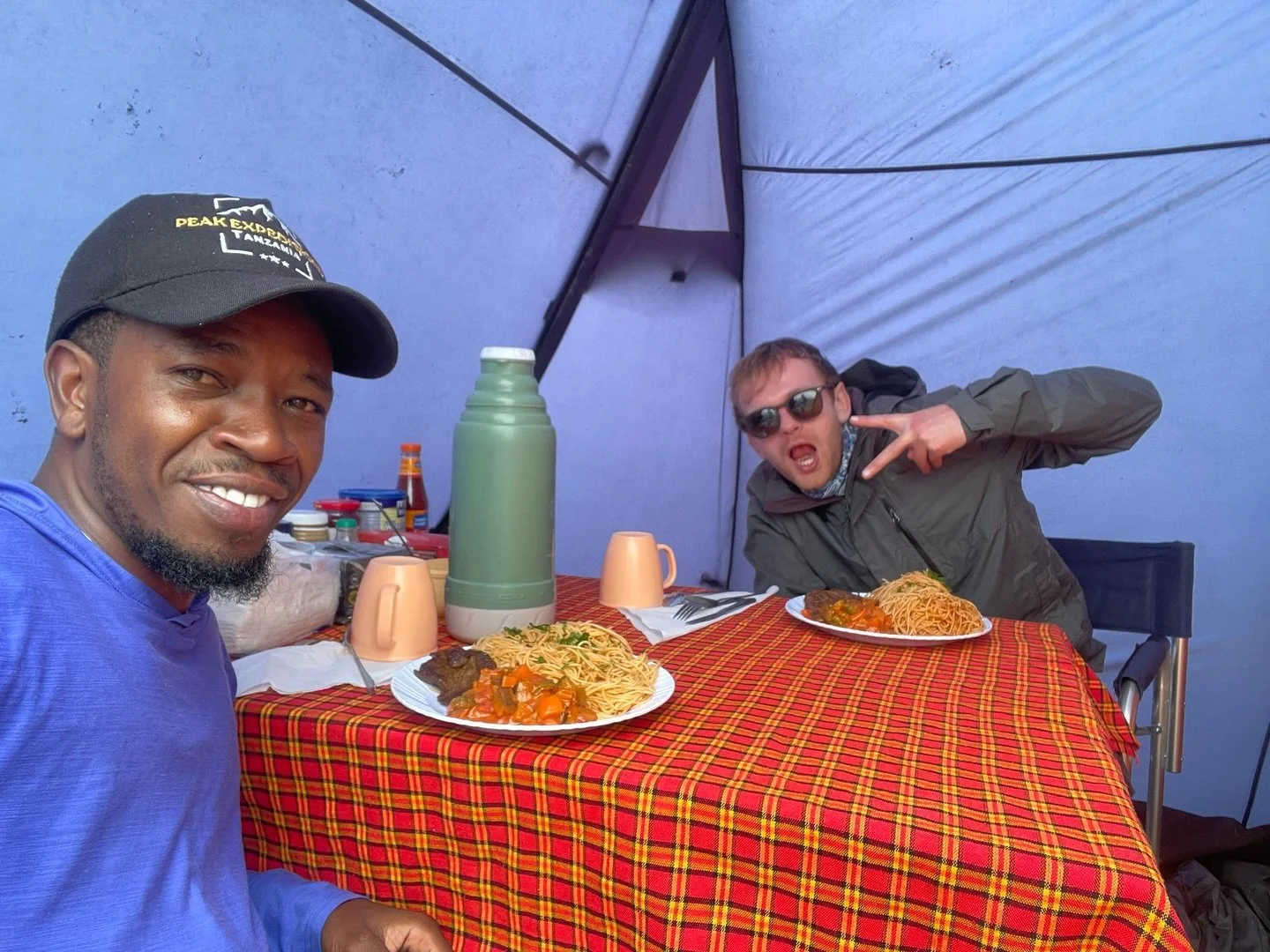 After a good solid days hike! A hot meal always does the trick. Joshua and Raymond enjoy a dinner for two at Shira camp 🍜🥘🥙

#Dinner #PeakexpeditionsTanzania #Shiracamp #Machameroute #Mykilimanjaro