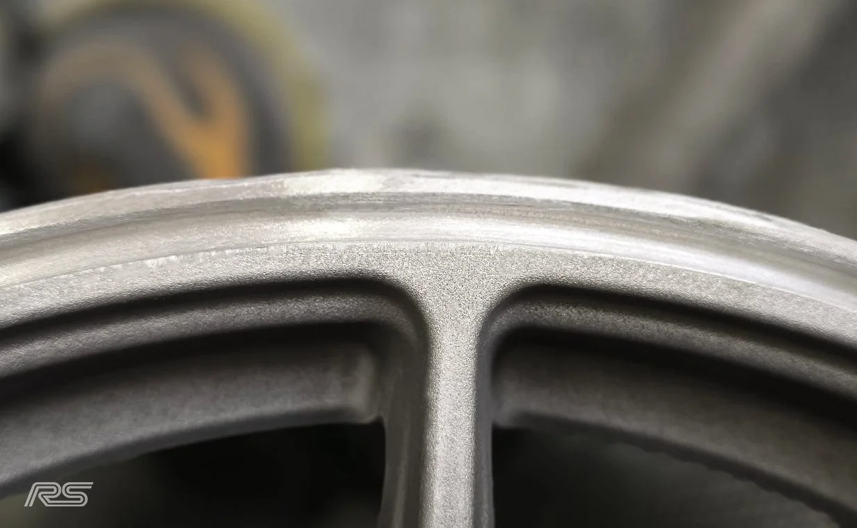 close up of a welded alloy before it has been refinished with powdercoating