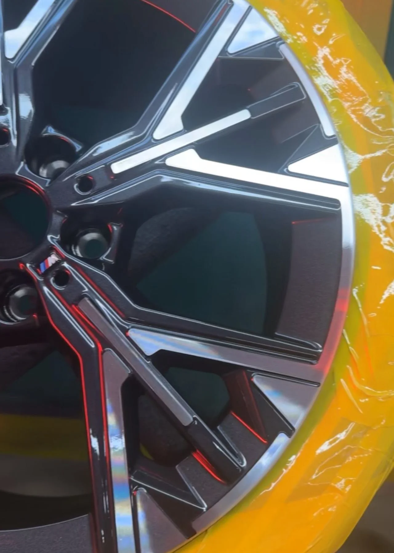 Close-up of a alloy wheel being repaired in a CNC SMART Repair Van
