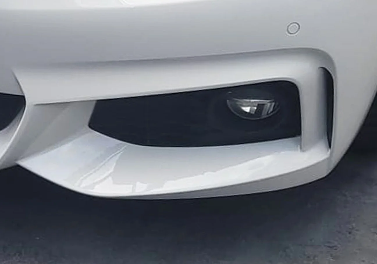 White Car shown after an expert  onsite smart repair by RS Wheels