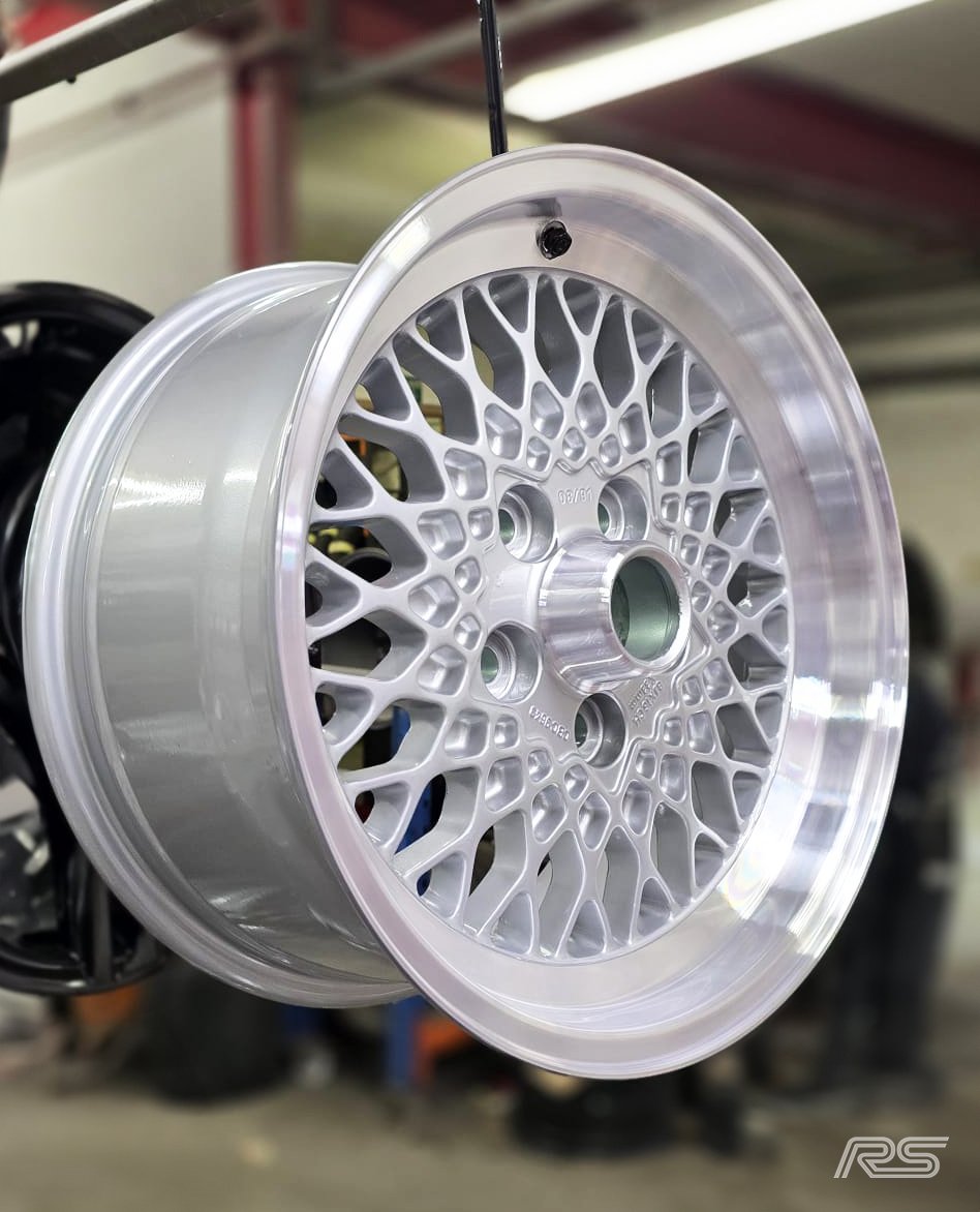 A silver alloy that has had the rim diamond cut to a high quality finish