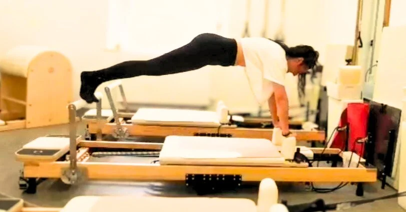 Pilates Reformer Leg Pull exercise at Studio Di Rosa in Shankill, Dublin, developing core strength, shoulder stability and full-body control.