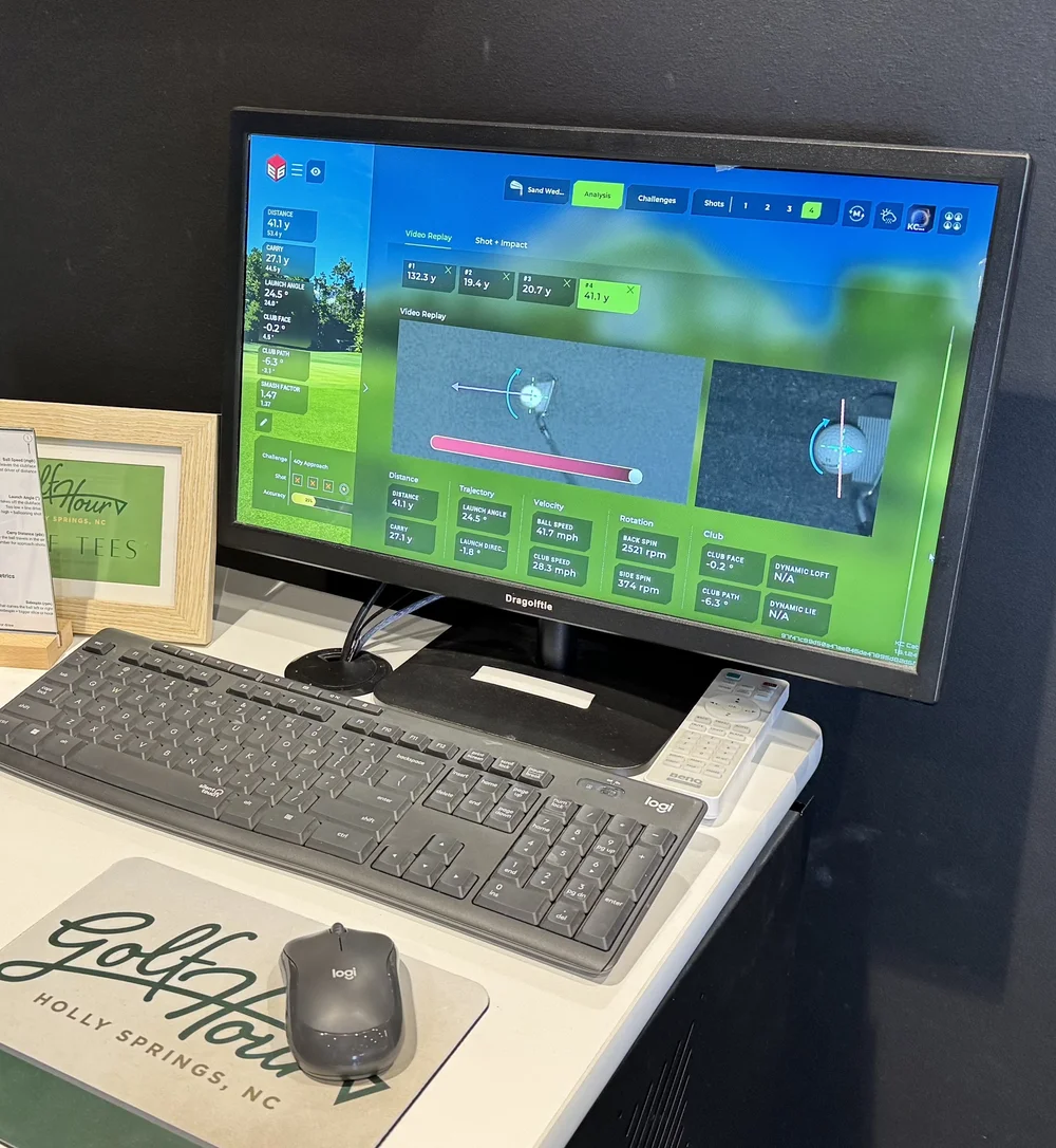 Indoor golf practice at Golf Hour