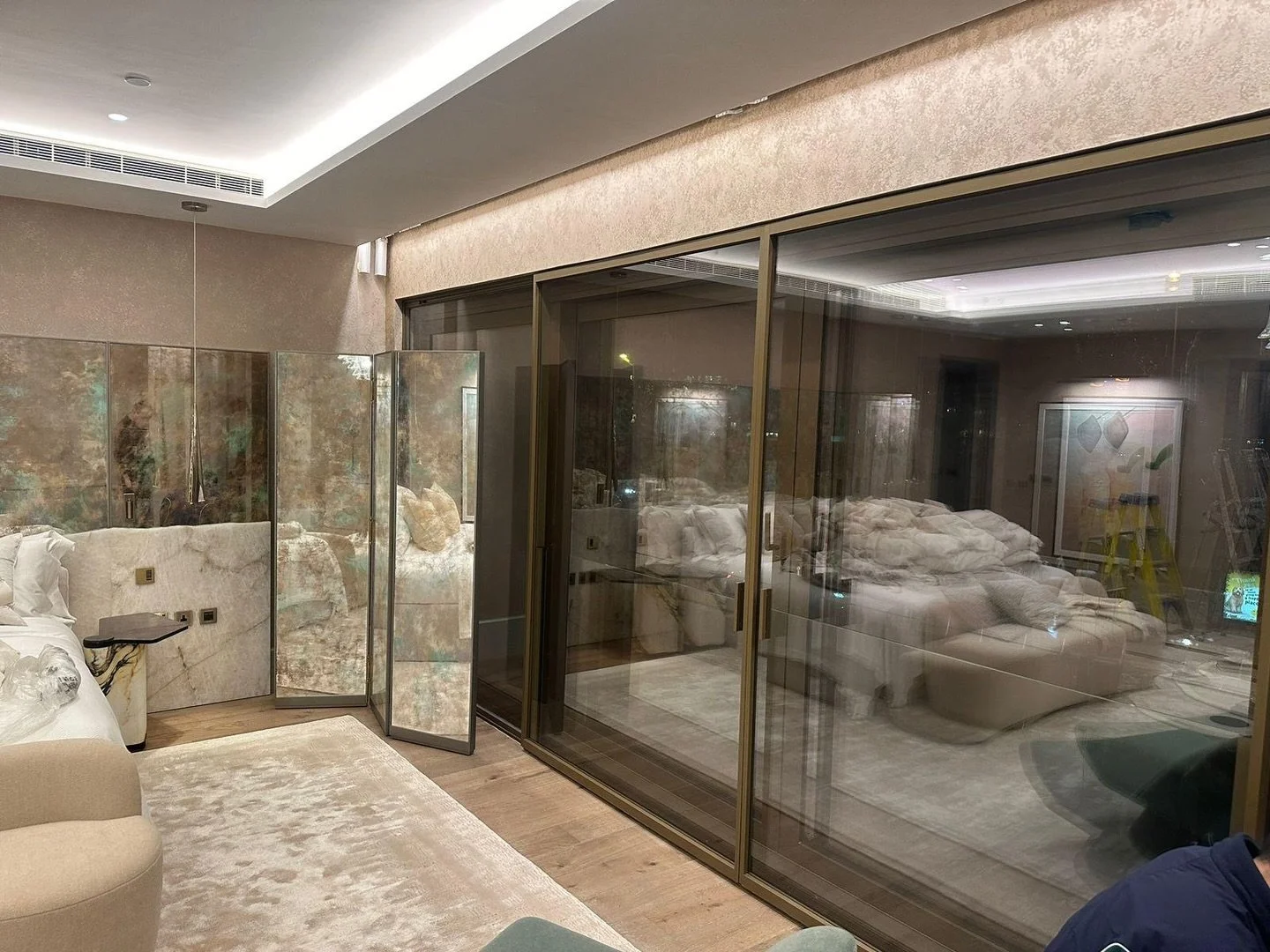 Transform Your Space with AtoZ Design and Glass

Step into elegance. This bespoke bedroom design blends modern luxury with timeless comfort &mdash; from the plush gradient rug to the crystal chandelier that steals the spotlight. At AtoZ Design and Gl