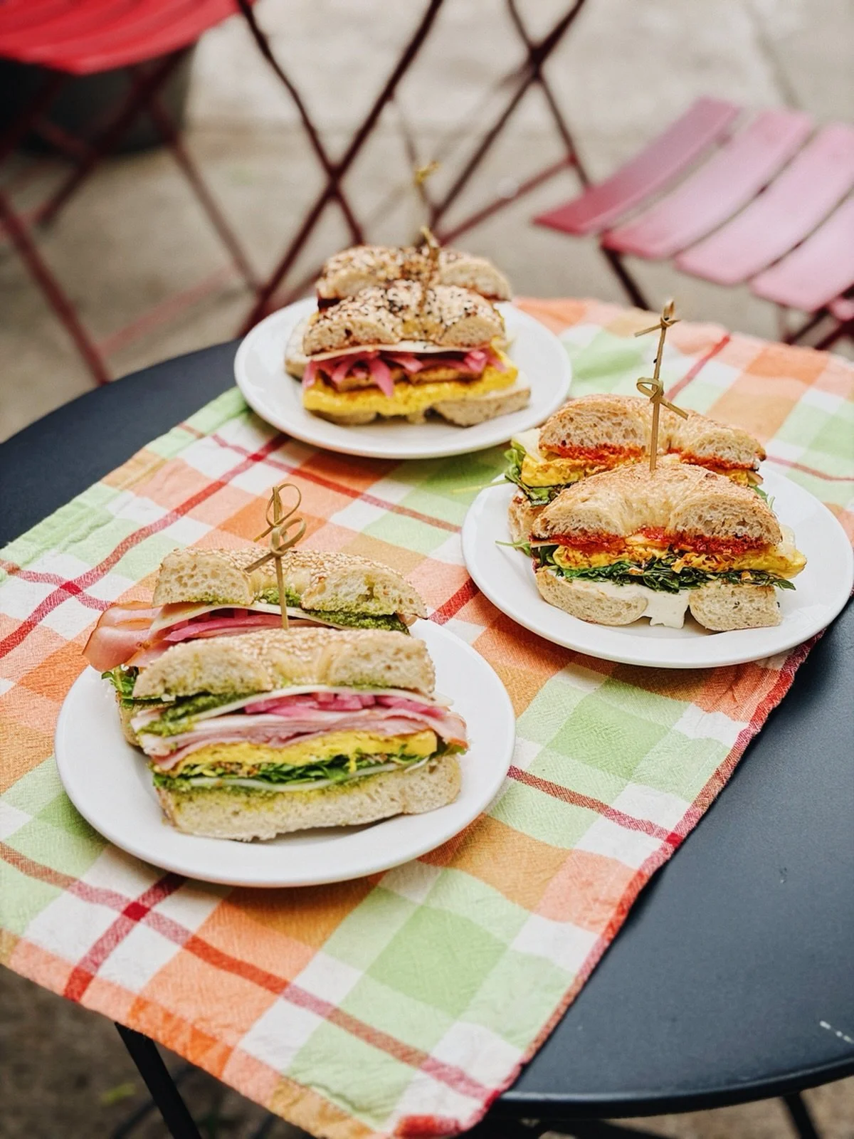 Our summer breakfast sandwiches are no joke. Ham &amp; Pesto, Harissa &amp; Egg, BBQ Tofu, bring a friend so you can try them all!! 🥯🍳