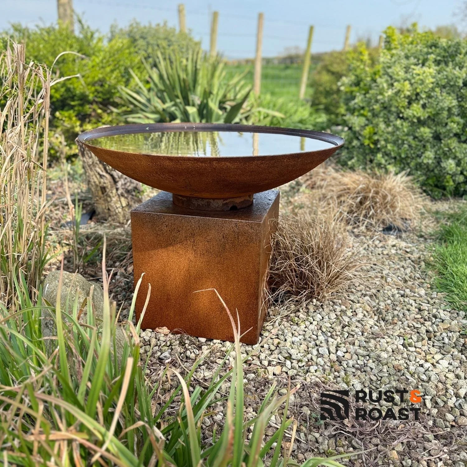 steel water feature corten steel pedestal garden setting