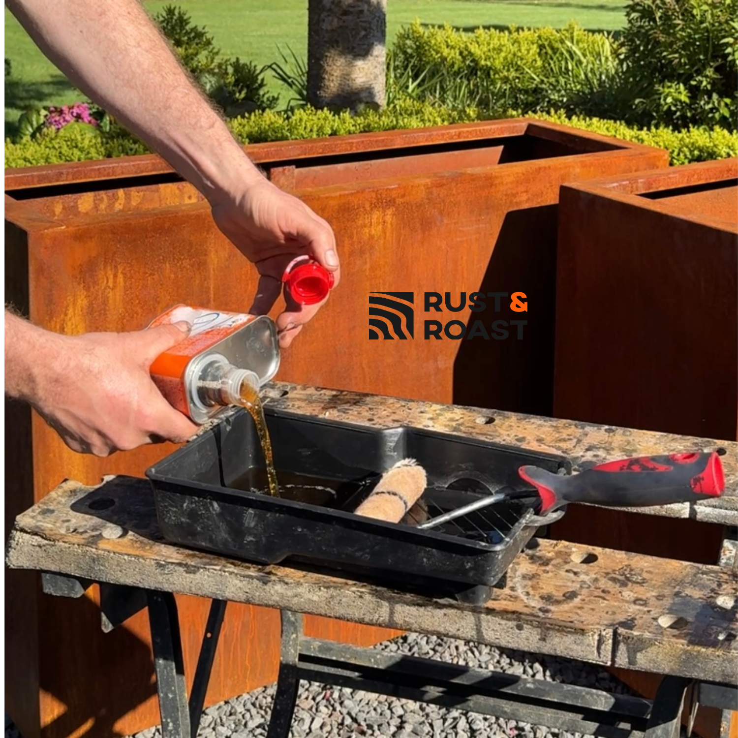 Applying Owatrol Oil to weathered corten steel using a roller