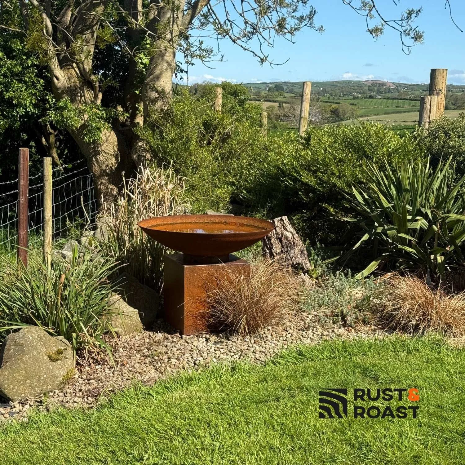 steel water feature corten steel pedestal garden setting