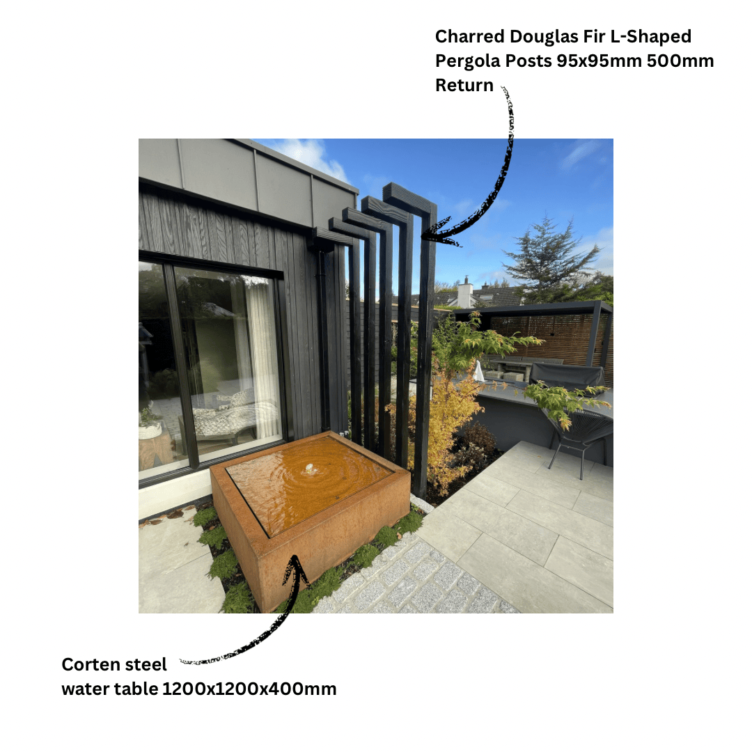 Charred Douglas fir Shou Sugi Ban pergola posts with L-shaped timber return in a modern landscaped garden with corten steel water table