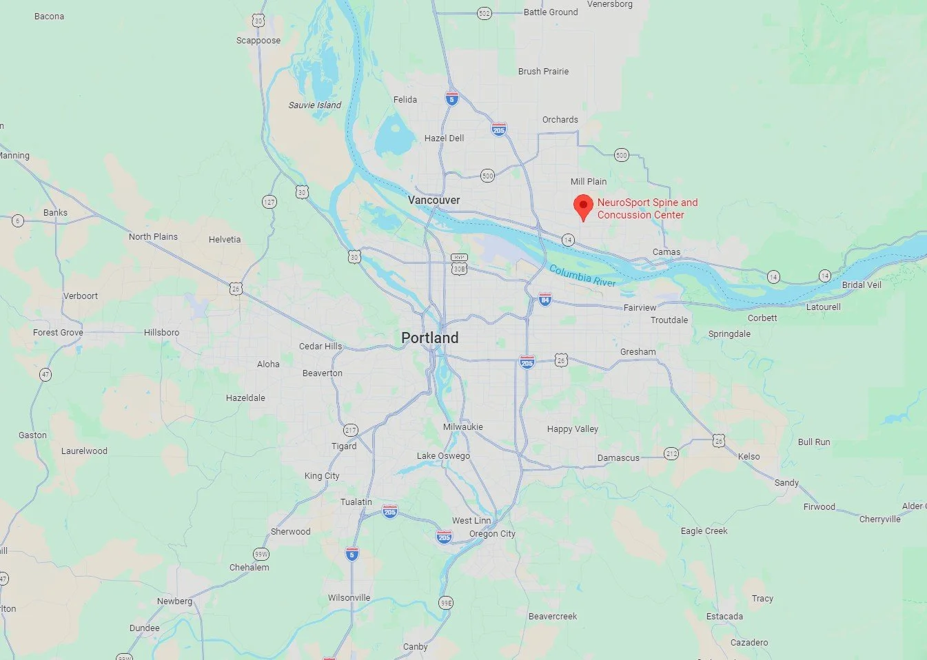 Map of Portland, Oregon, showing surrounding neighborhoods and the Columbia River. A marker indicates the location of NeuroSport Spine and Concussion Center in the northeastern part of Vancouver, Washington.
