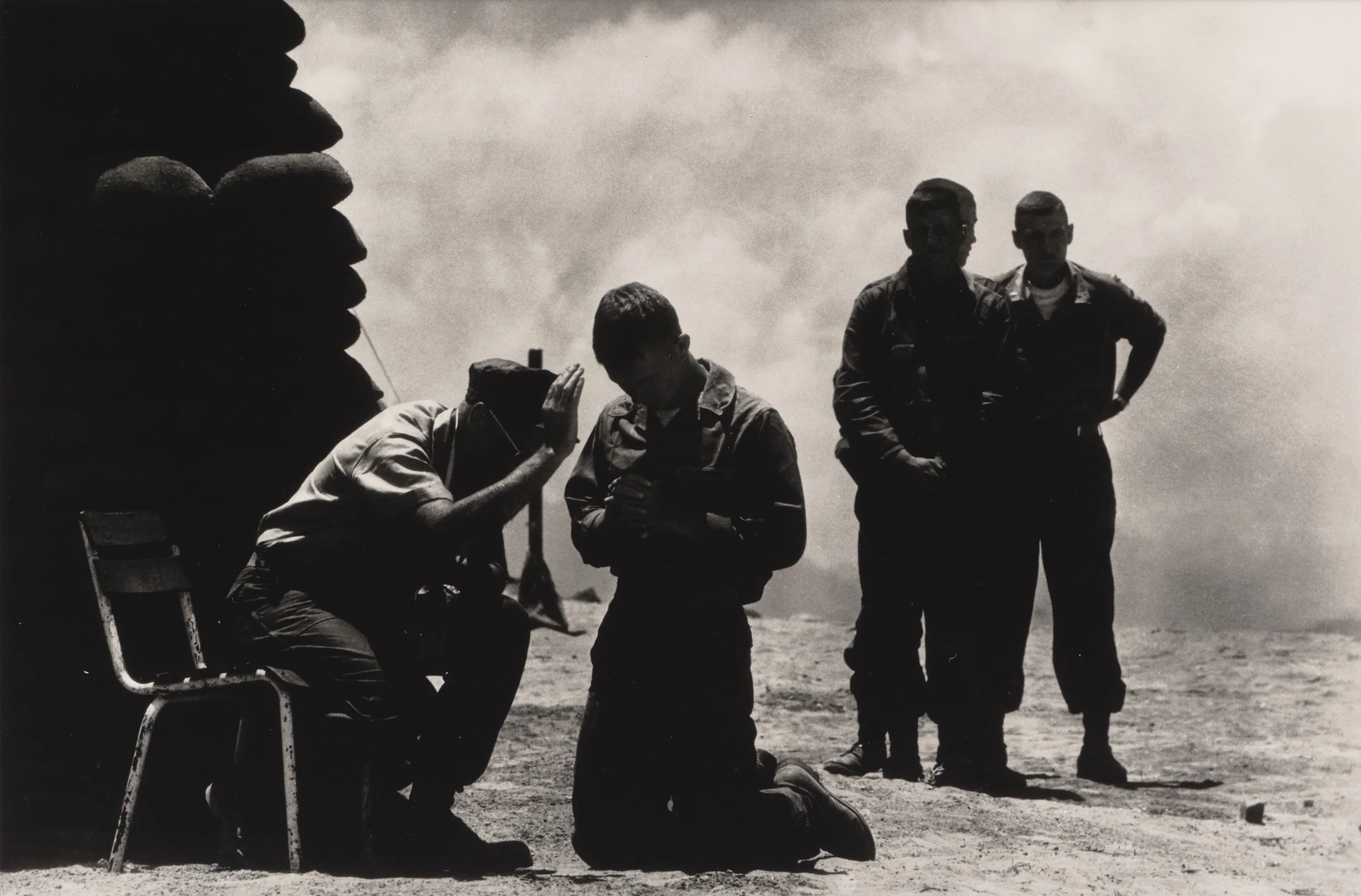 On a Hill in Da Nang a Priest Hears Soldiers' Confessions, 1969 © Don McCullin. Courtesy the artist and Hauser & Wirth