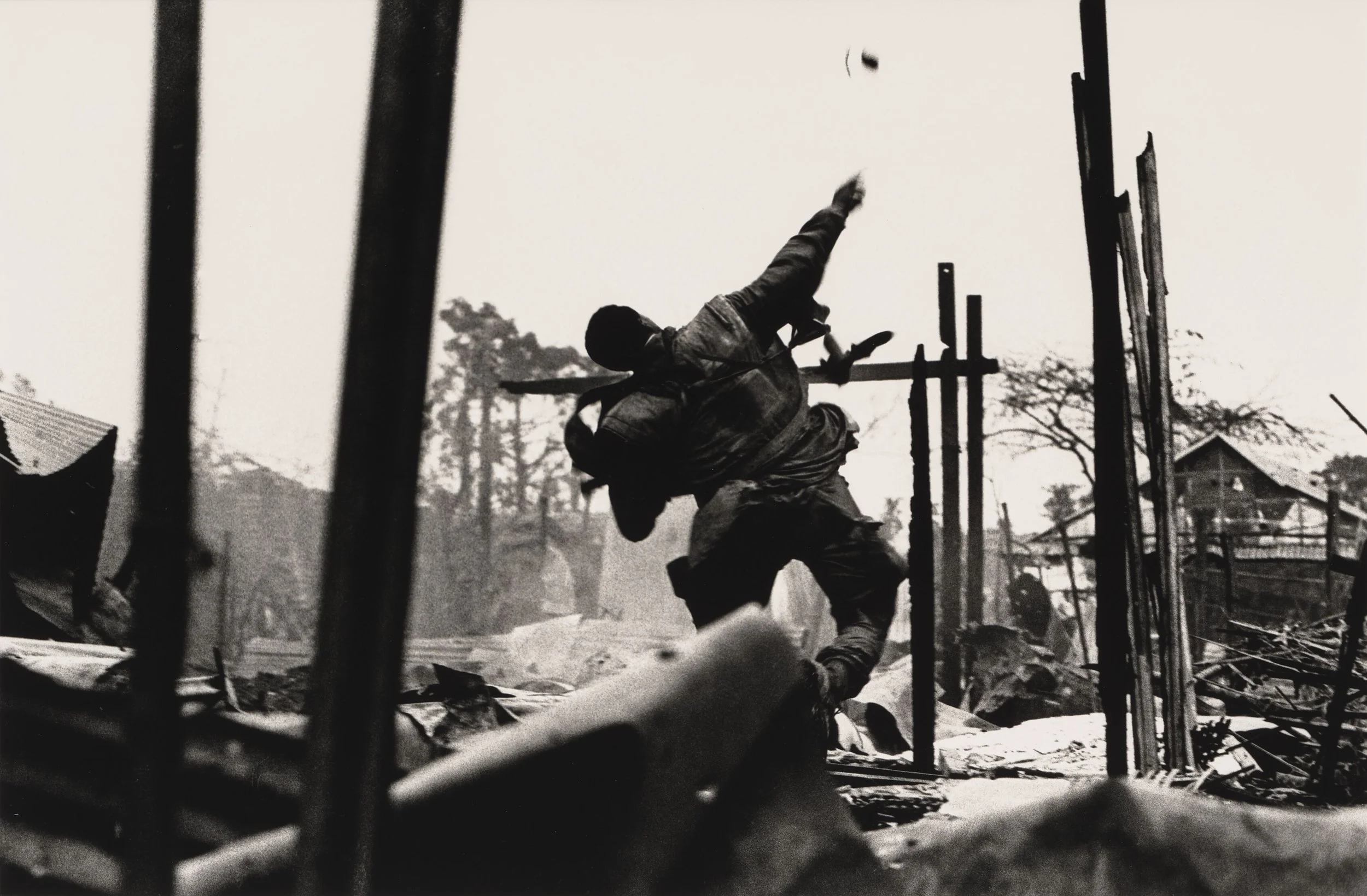 A US Marine Hurling a Grenade, Huế, 1968 © Don McCullin. Courtesy the artist and Hauser & Wirth