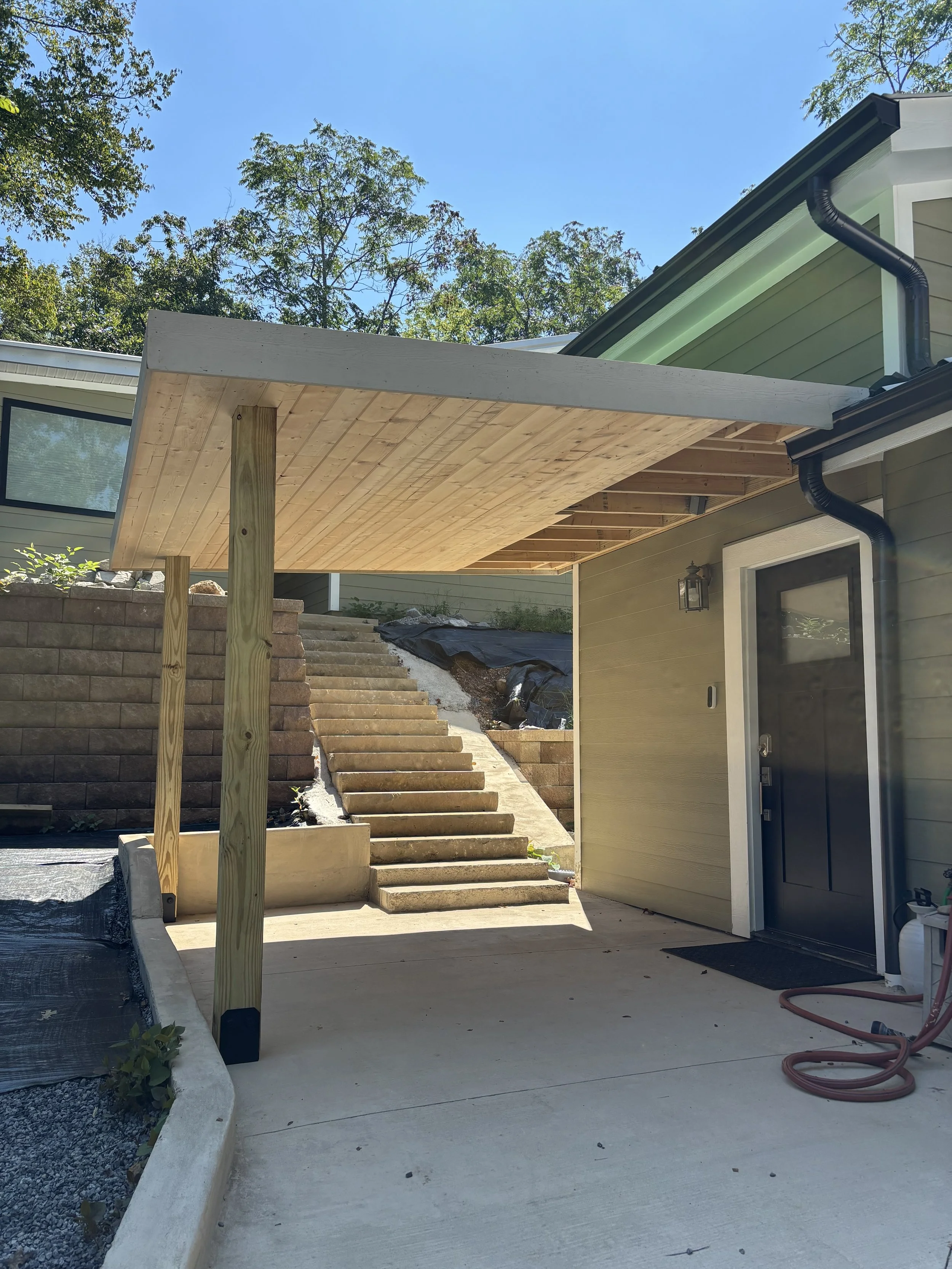 Final touches of the patio roof on this addition