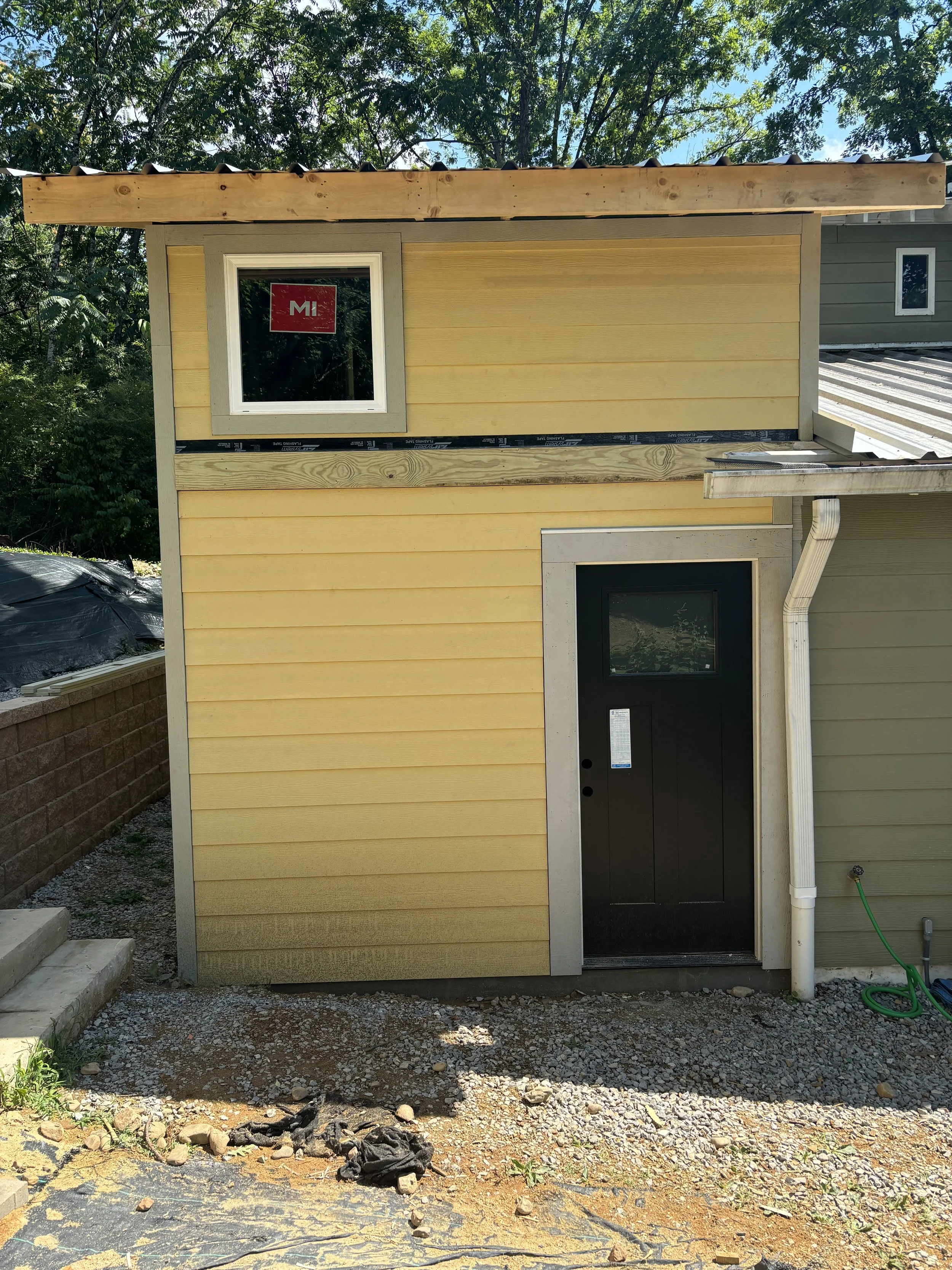 Completed addition entry in process, before the patio completion