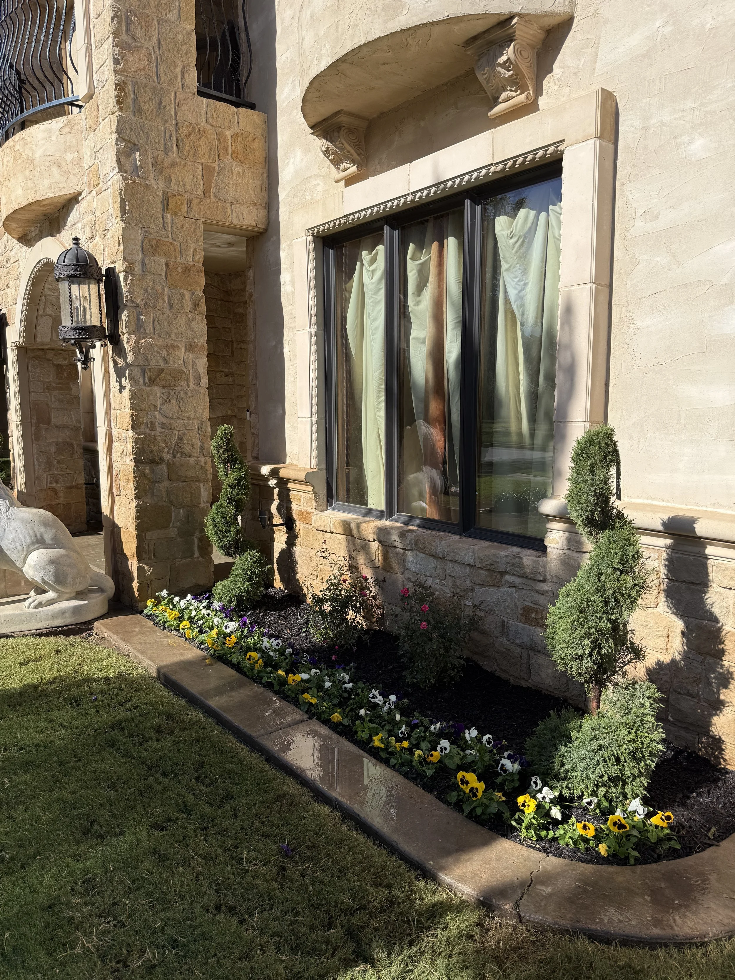 flower-bed-landscaping-front-yard-lubbock-natures-edge.jpeg