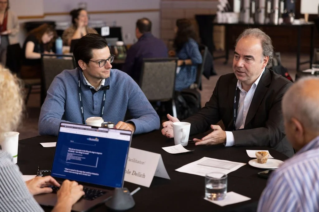 Attendees at an eSummit roundtable session