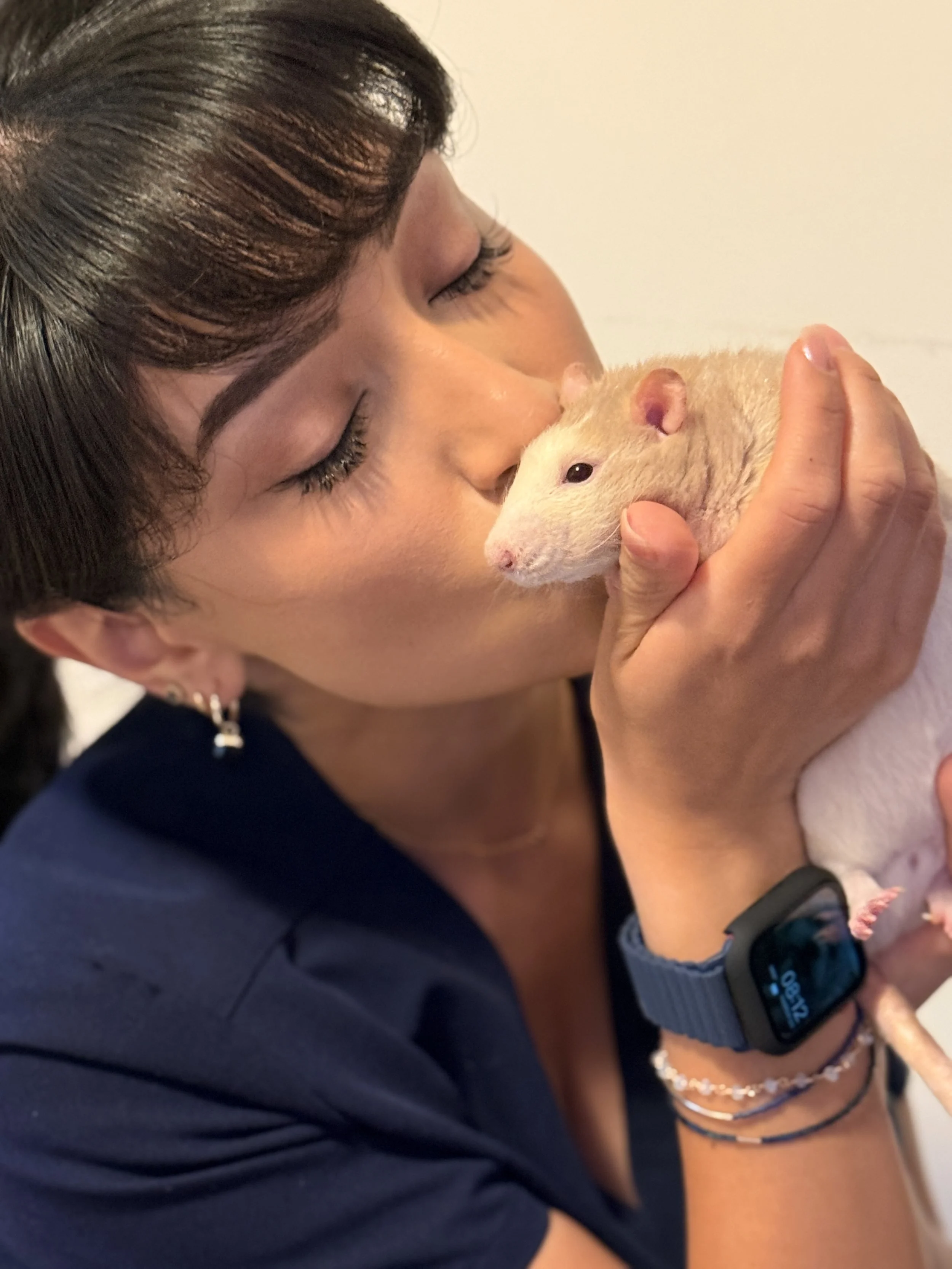 Justina giving love her sweet pet rat