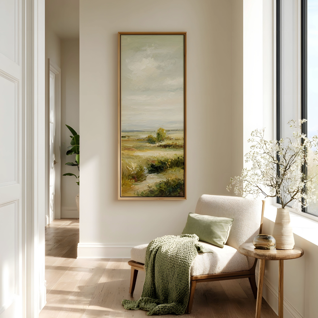 A neutral chair positioned by a large window, filled with soft natural light, suggesting a calm and simplified living space.