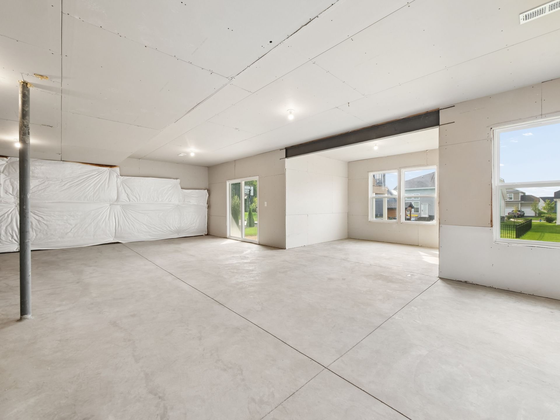 Light-filled walkout lower level at 9770 Brindlewood Drive offers so many possibilities!