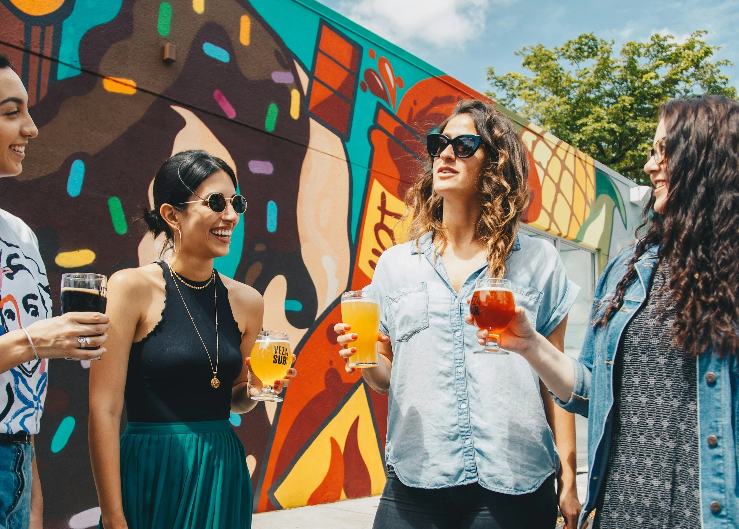 group of people gathers with drinks