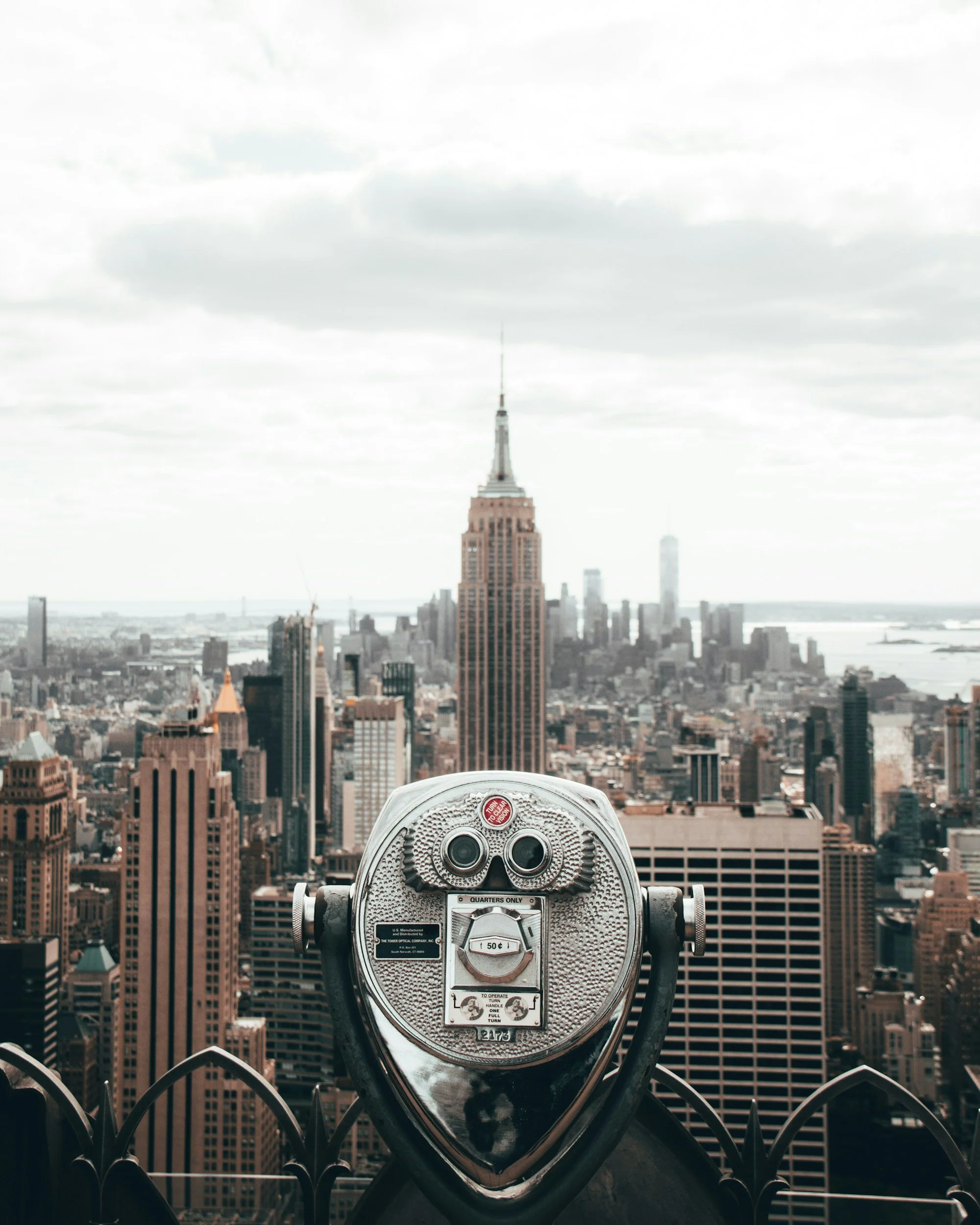 sight finder looking over nyc with empire state building in view