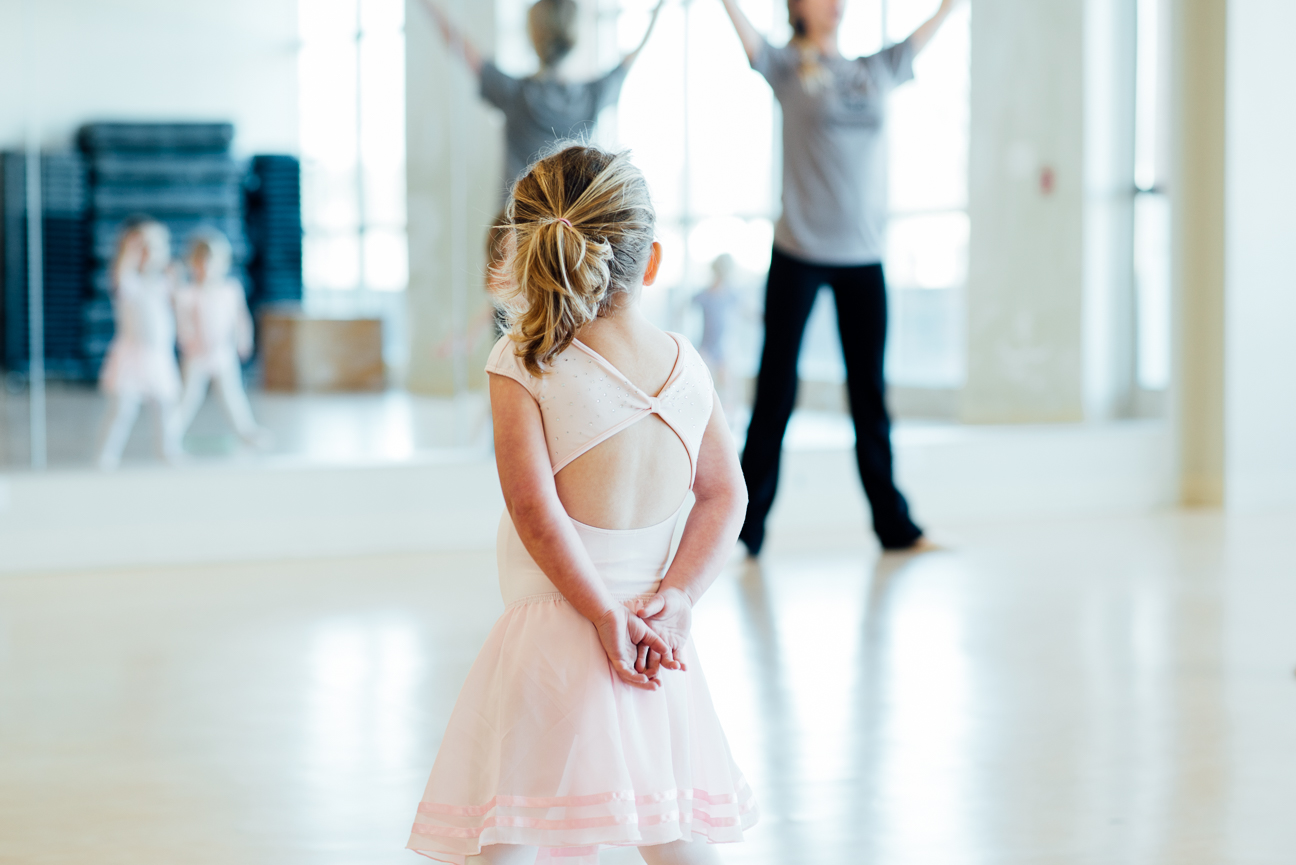 Young Dancer watching the teacher in ballet class