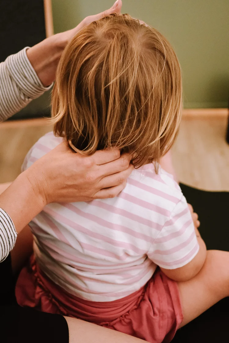 A child visiting W Bar Chiropractic
