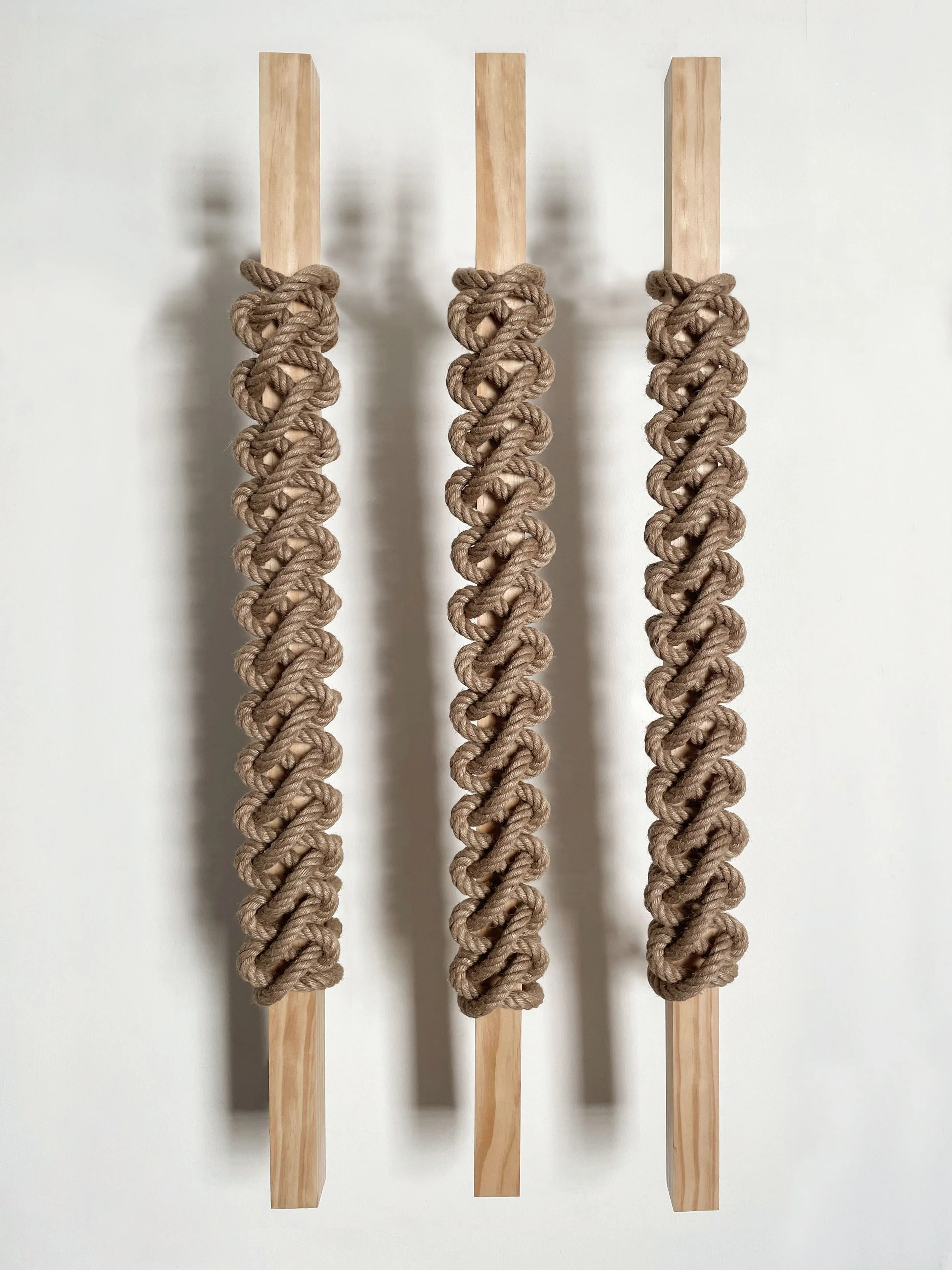 Warm, grain-rich timber dimensional fiber organic modern wall sculpture