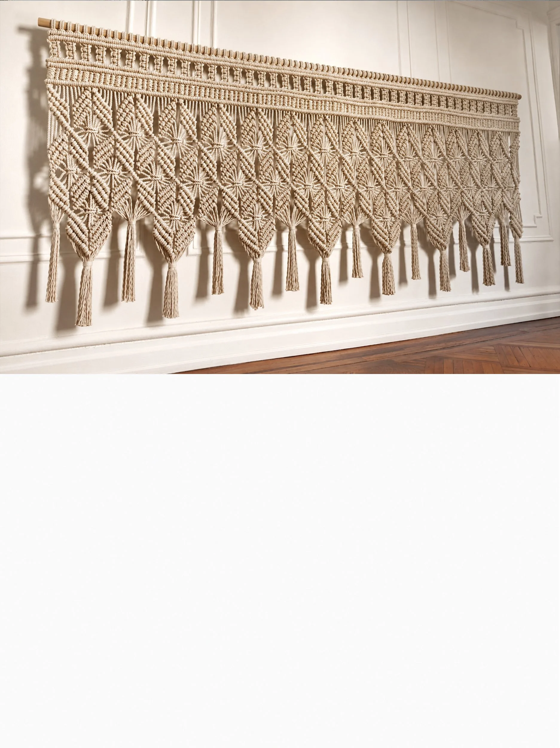 9-foot wide vintage-inspired luxury macrame wall hanging handcrafted from organic cotton rope, made to hang above a credenza.