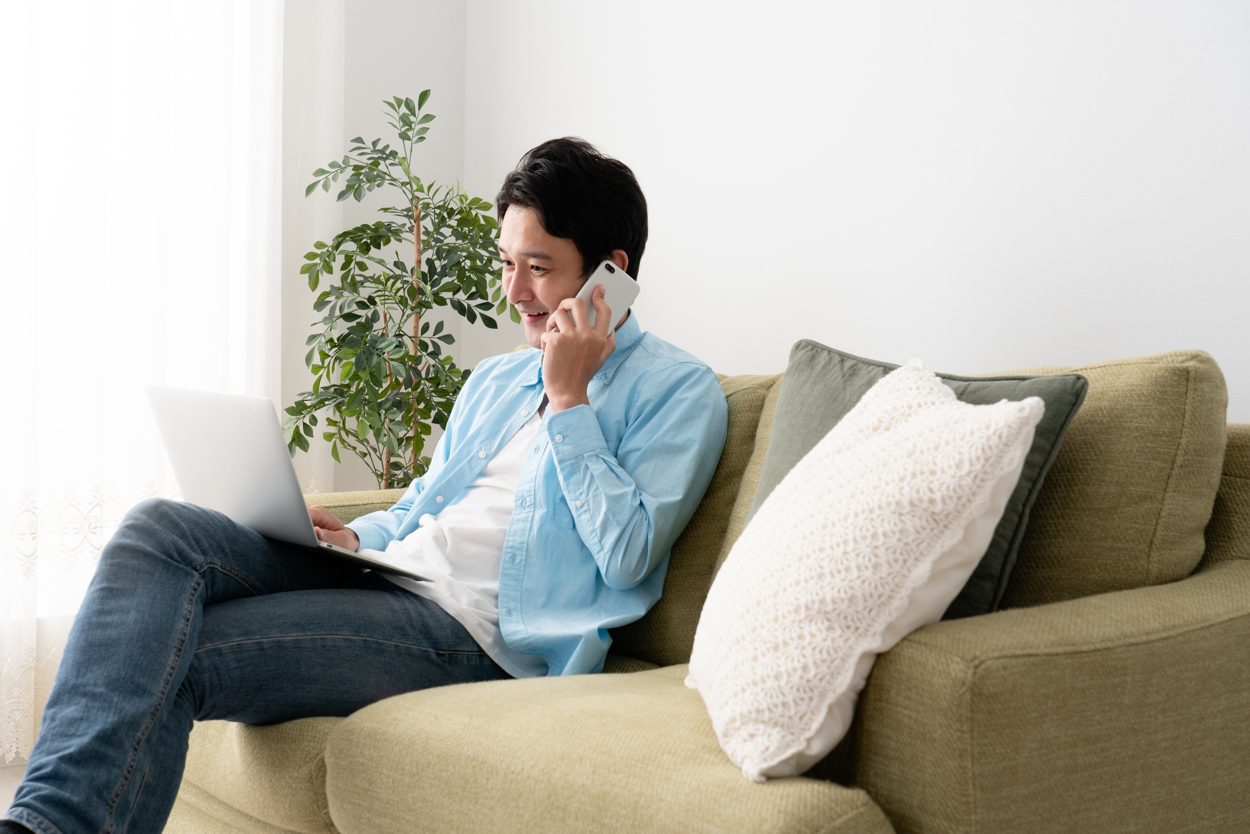 Person using a laptop to schedule a healthcare appointment online