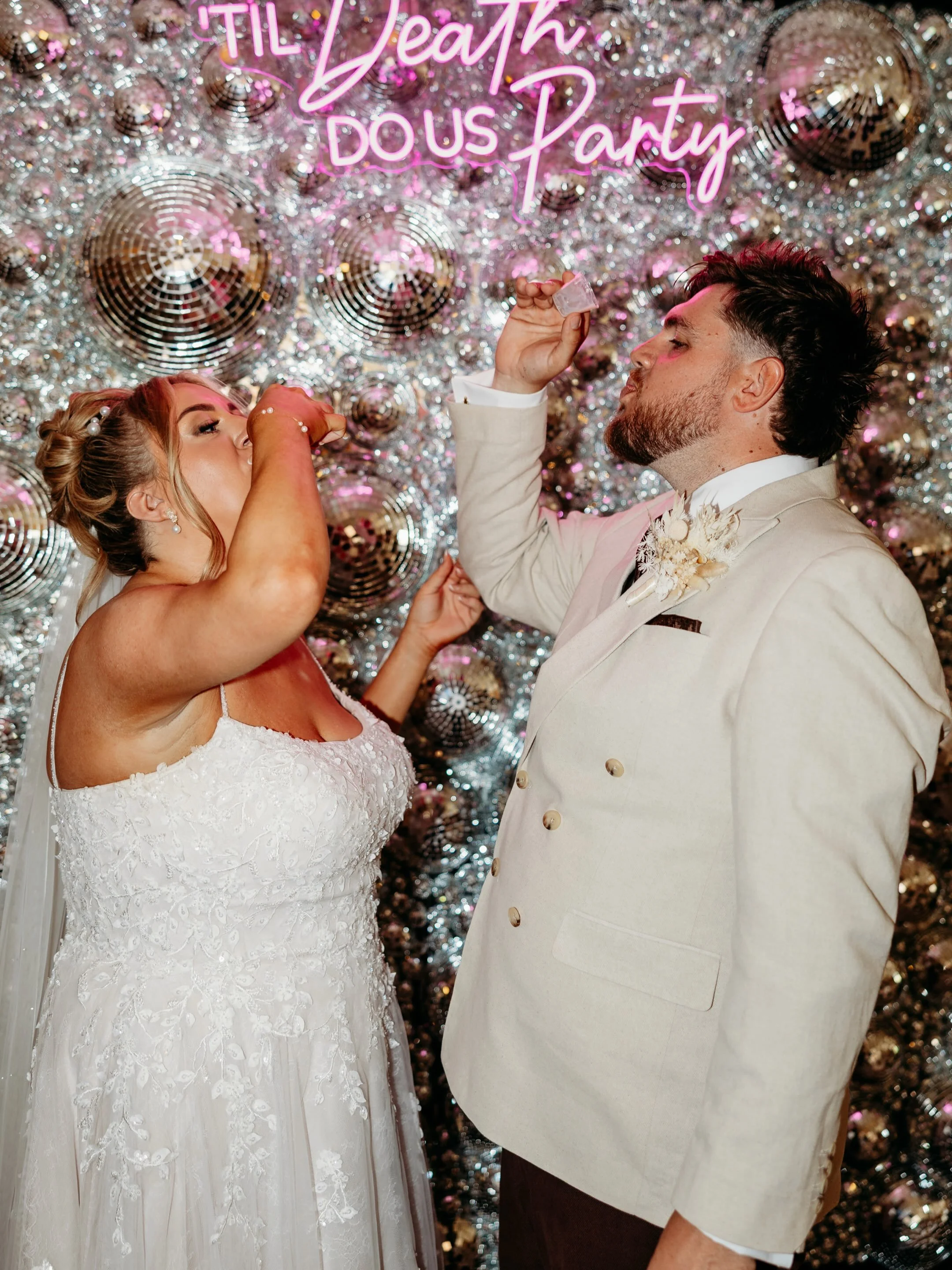 This is a public service announcement to get your husband-to-be to make you a disco ball wall 👌🏻🪩 

A HUGE congratulations to C &amp; T - what a wedding, what a party! 🕺💖 

Photographers: @jordhanphotography 
Dress: @lauramaybridal 
Suits: @dobe