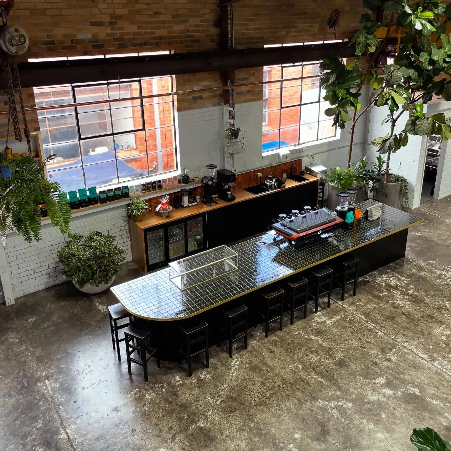 Looking down on the brew bar at the start of the week, coffee on, space open and ready for the day ahead. Drop in if you&rsquo;re nearby.
