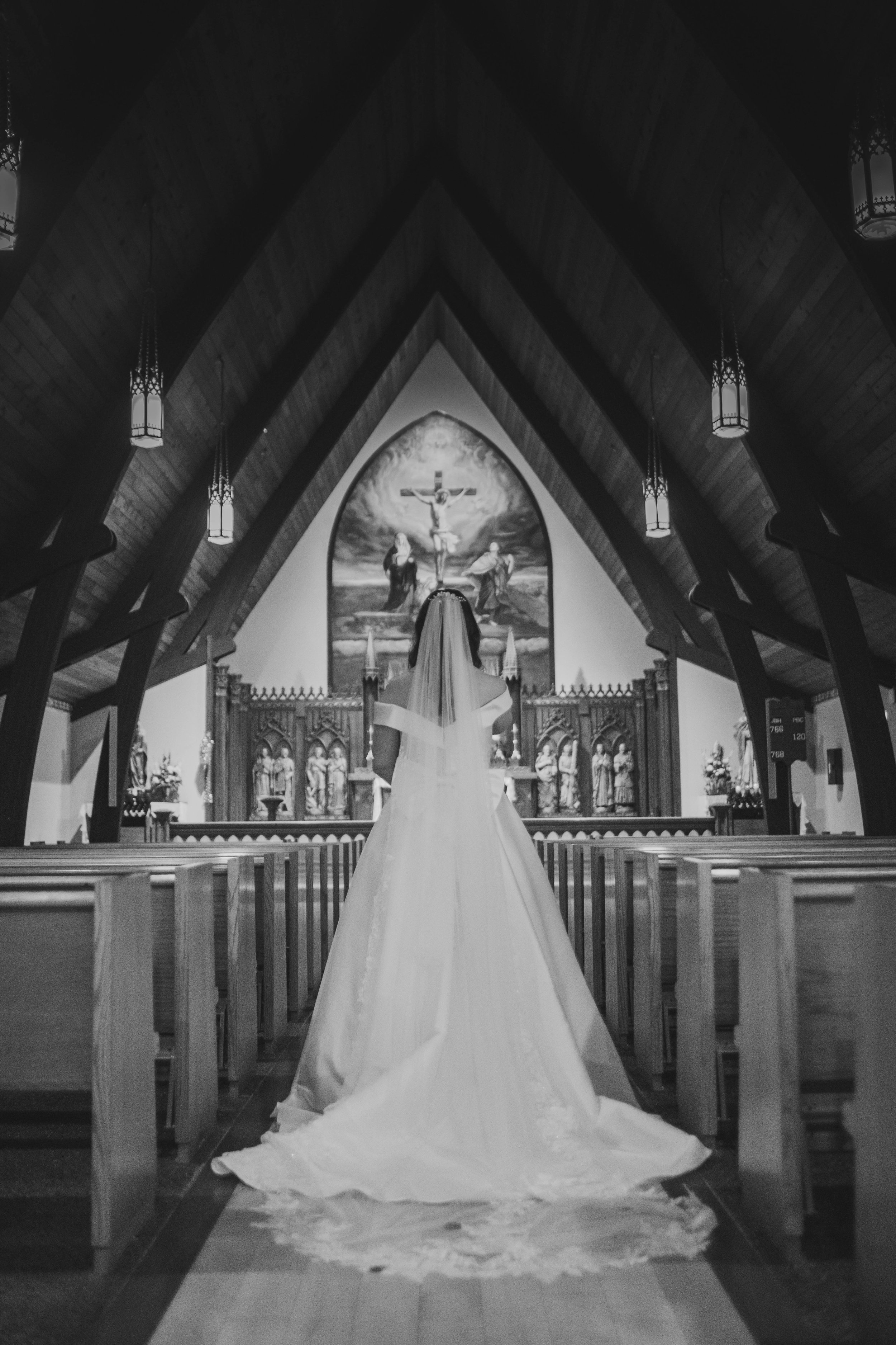 A bride walks the aisle for her TLM nuptial mass at North American Martyrs Parish in Edmonds, WA