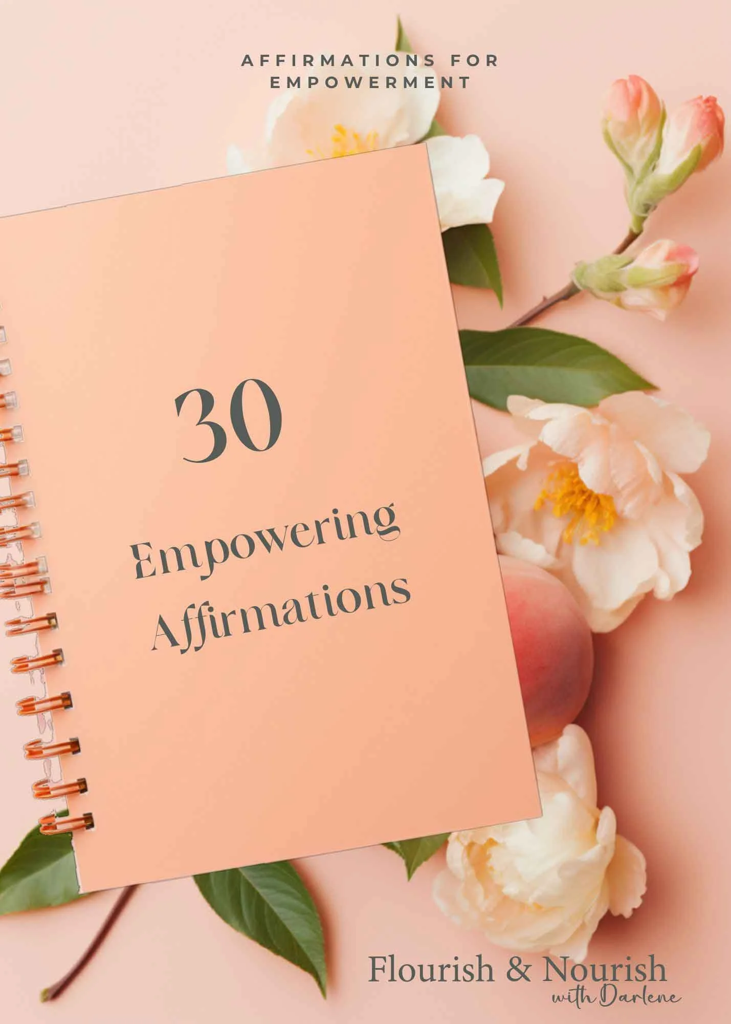 A pink spiral notebook with the text '30 Empowering Affirmations' on the cover, placed on a pink background with white and peach flowers and green leaves. Additional text reads 'Flourish & Nourish with Darlene'.