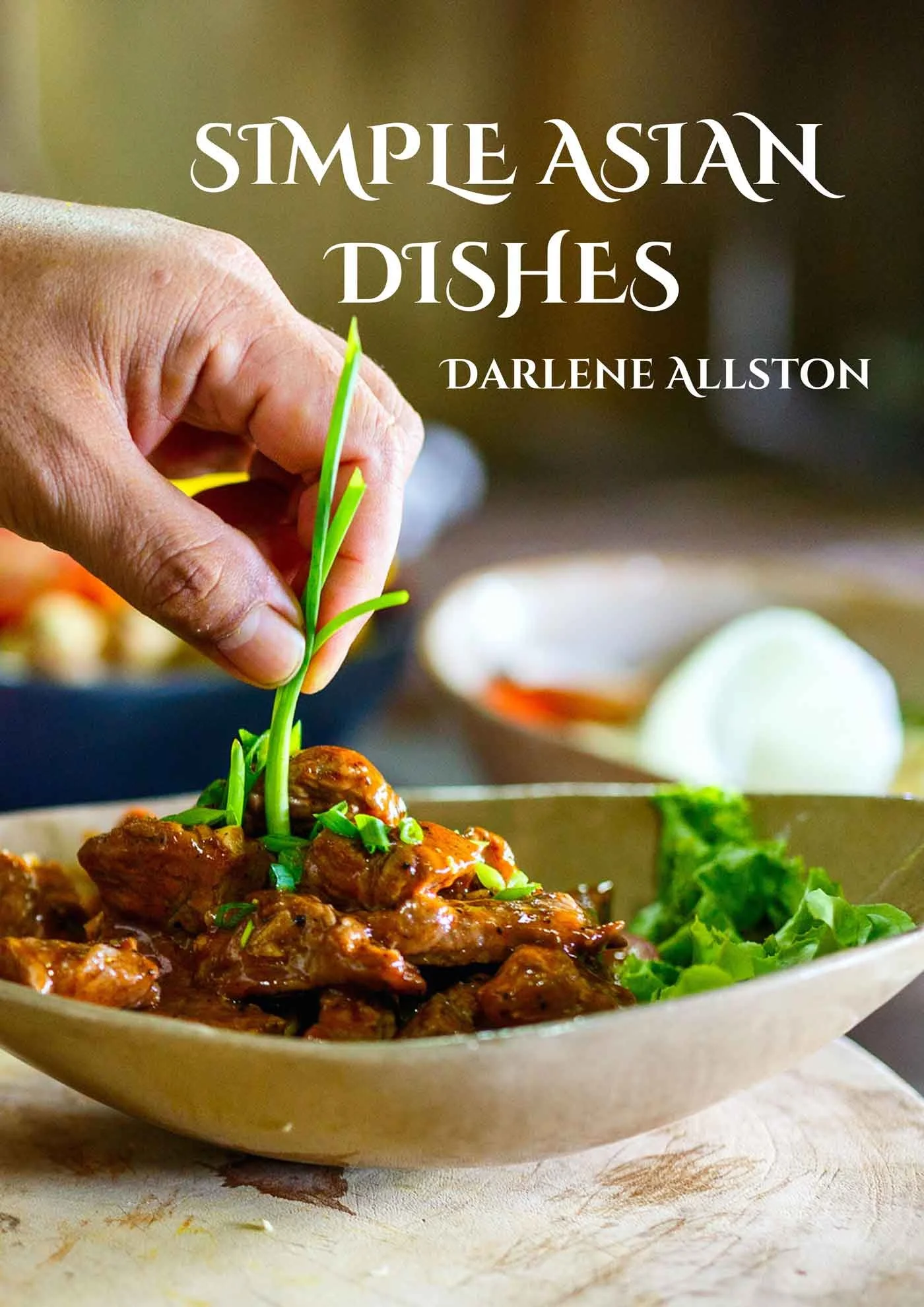 Cover of the book titled 'Simple Asian Dishes' by Darlene Allston, showing a hand garnishing a bowl of Asian-style beef stir-fry with green onions, rice, and lettuce in the background.