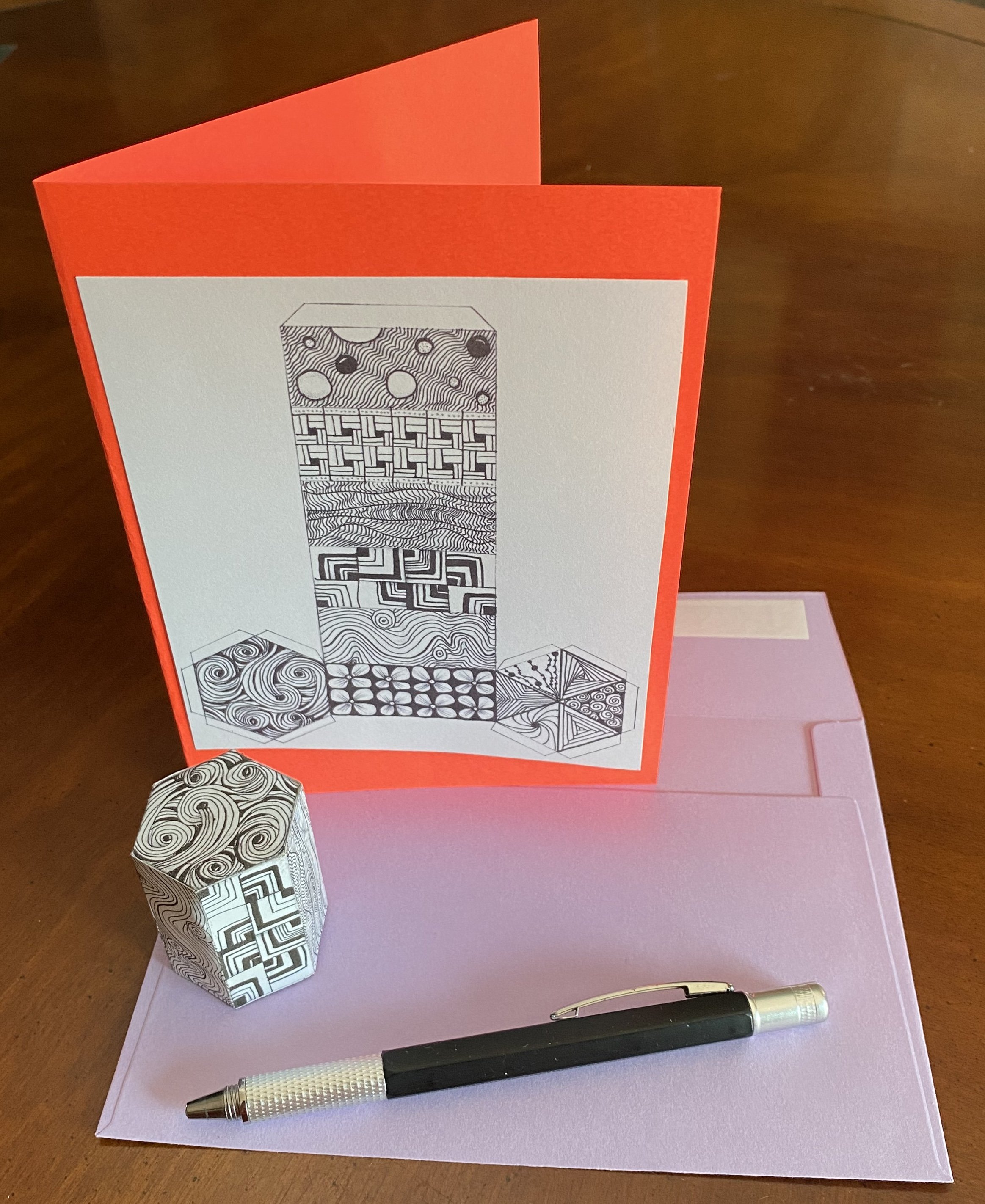 SHAPES TO SHOW - 34# - HEXAGONAL TALL PRISM #1 - SWERVE NIPA - NOTECARD WITH PROPS AND SHAPE.jpeg