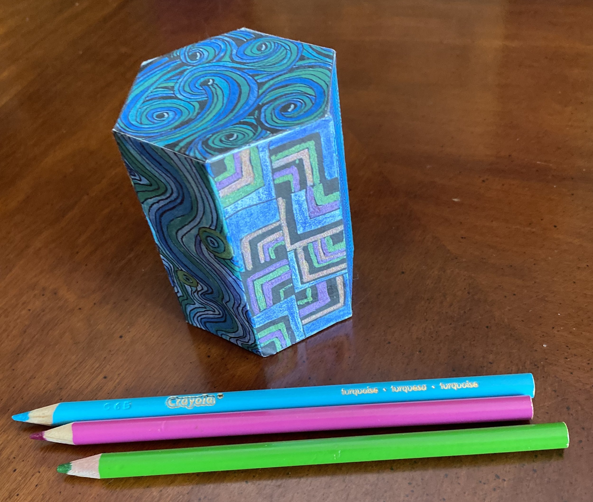 SHAPES TO SHOW - 34# - HEXAGONAL TALL PRISM #1 - SWERVE NIPA - COLORED SHAPE WITH PENCILS.jpeg