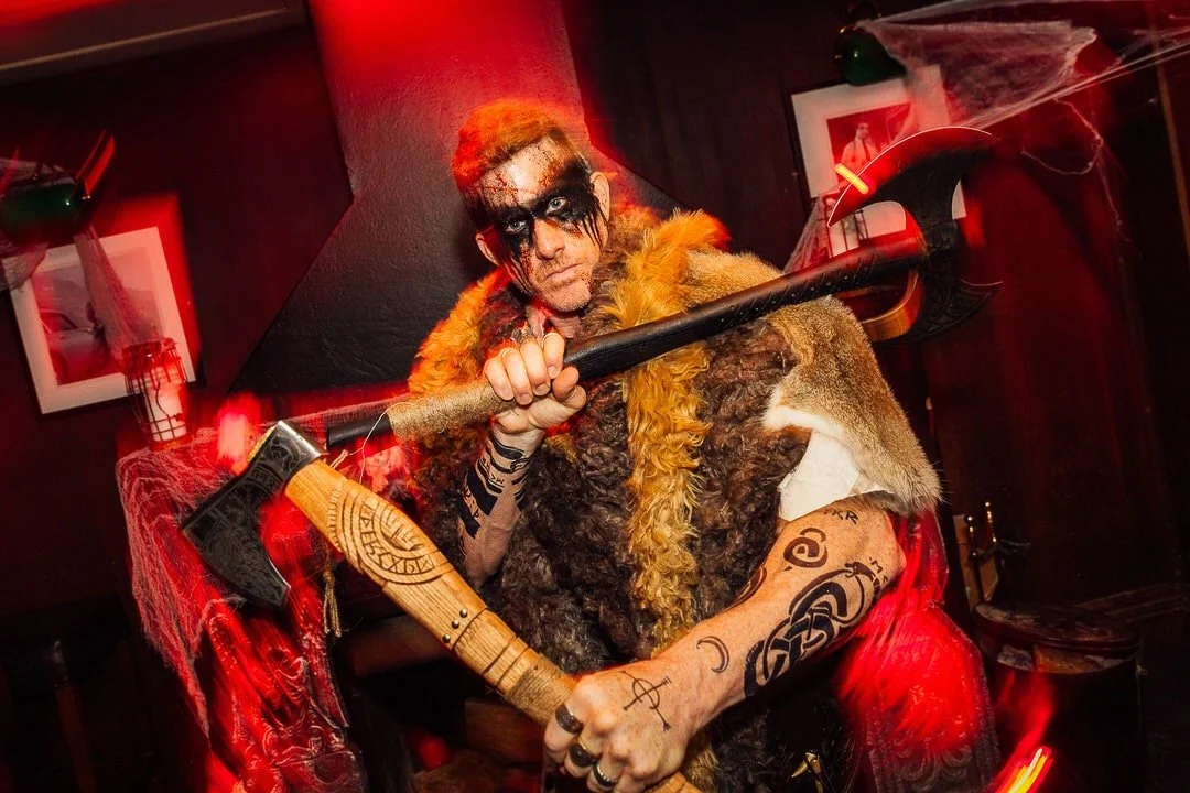 Frame-Power-Photography-Man-in-costume-and-makeup-holding-axes.jpg