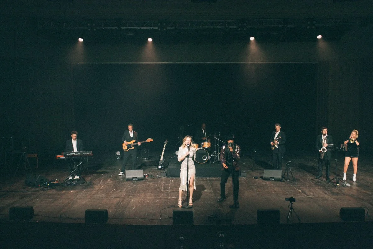 Lady Roc's band performing a multi-song live showcase with full band lineup