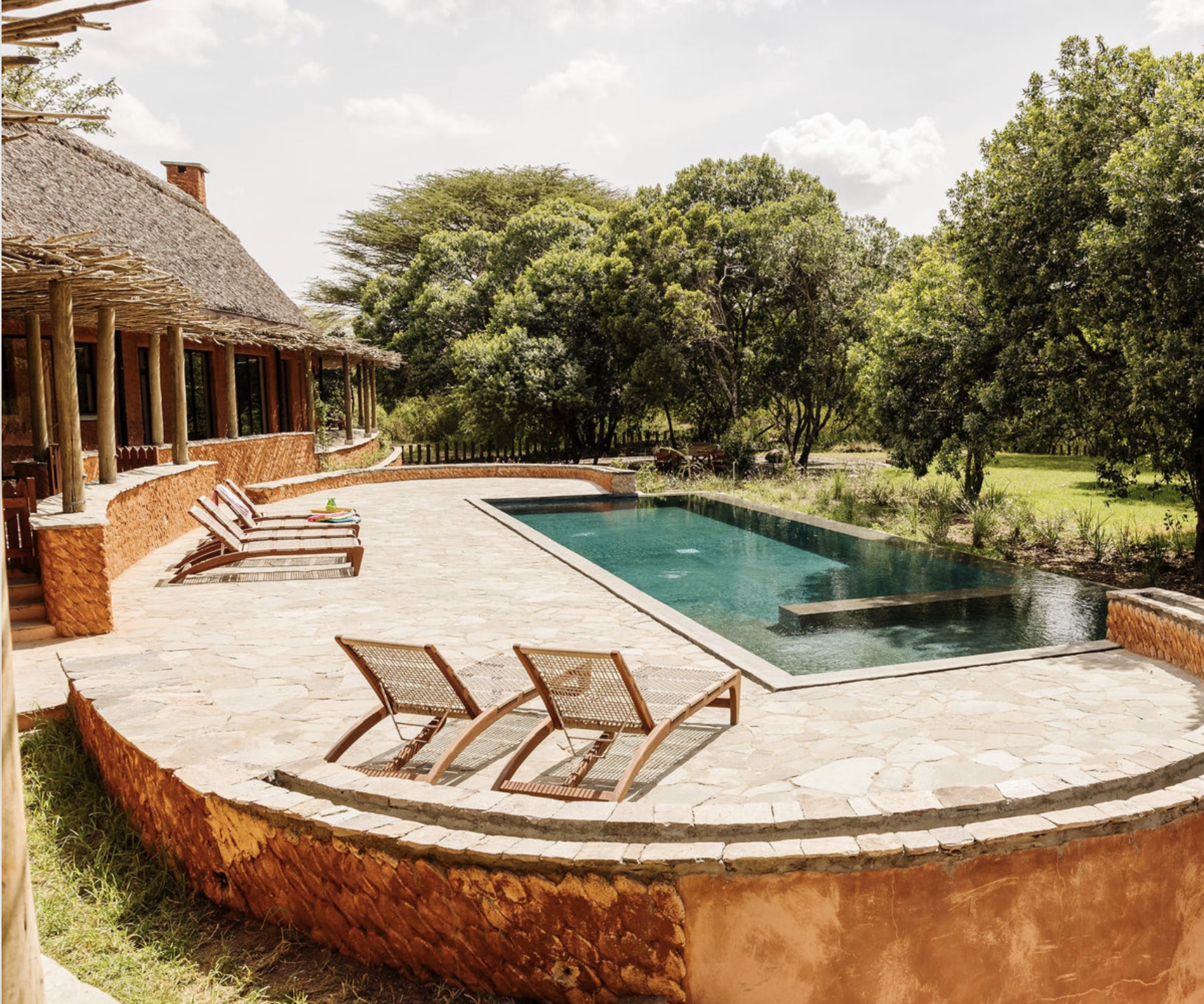 An outdoor pool in a private lodge in Kenya designed by Howark Design.