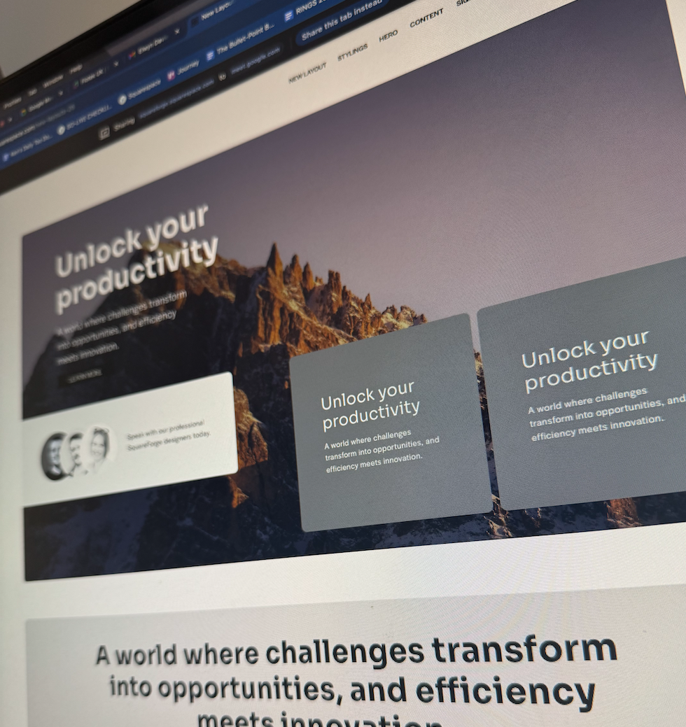 Computer screen displaying a website with the title 'Unlock your productivity' and a mountainous landscape background.