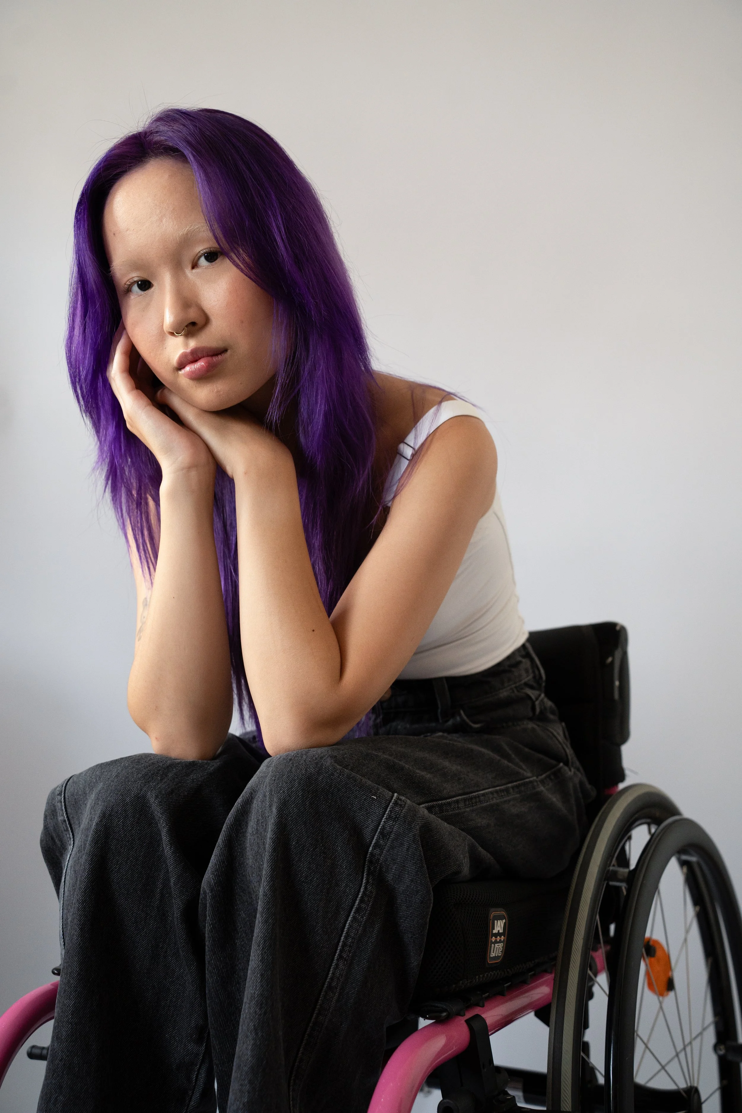 Portrait of Josie Tang - hands together