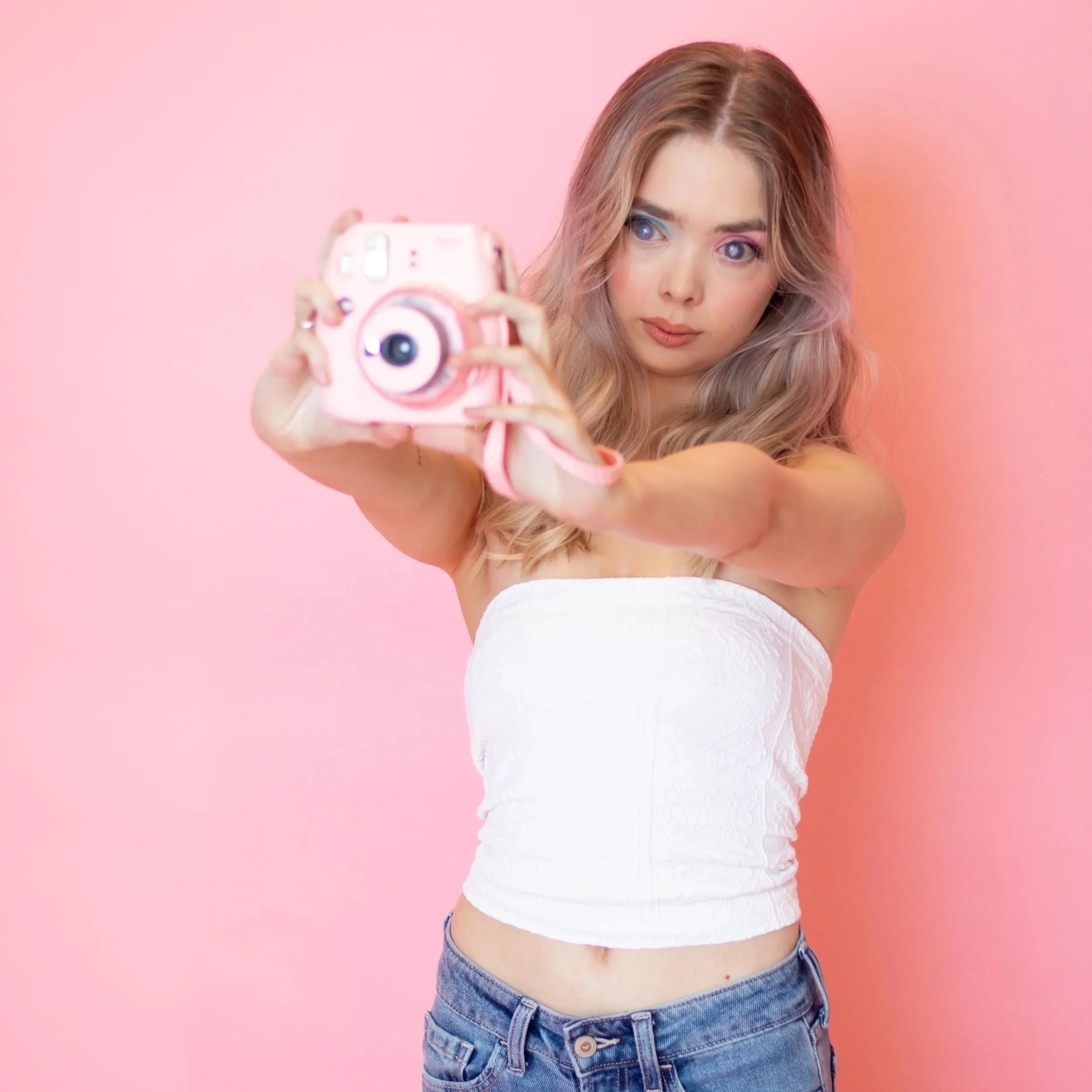 Kitty Hinde portrait - pink background