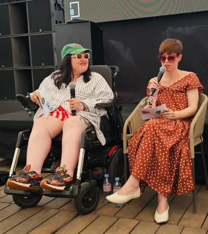 Founders Kelly & Emma talking on a panel in Cannes, France